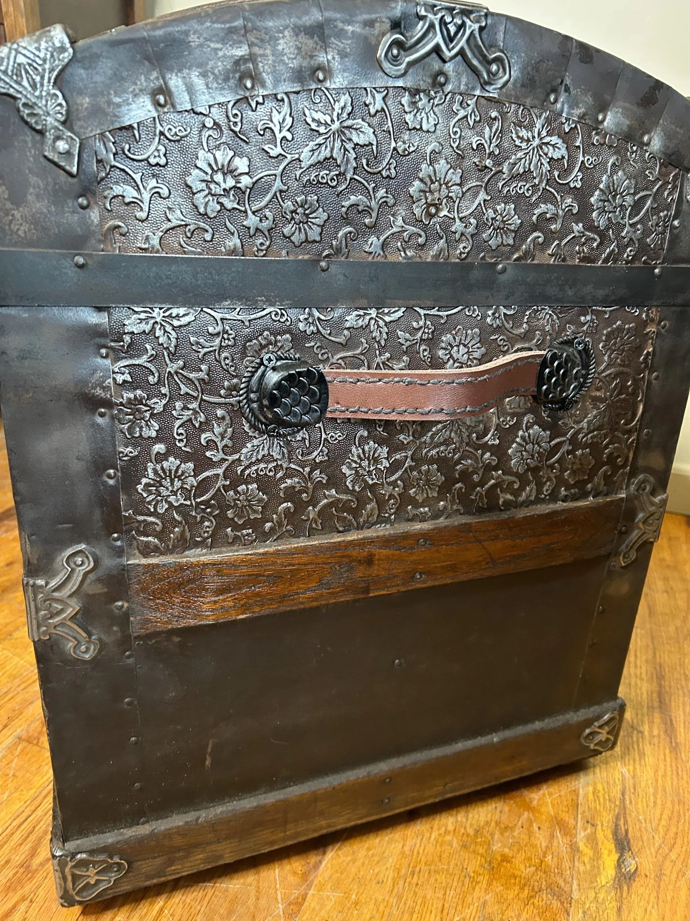 Side profile highlighting the high-profile arched dome lid and hand-applied patina.