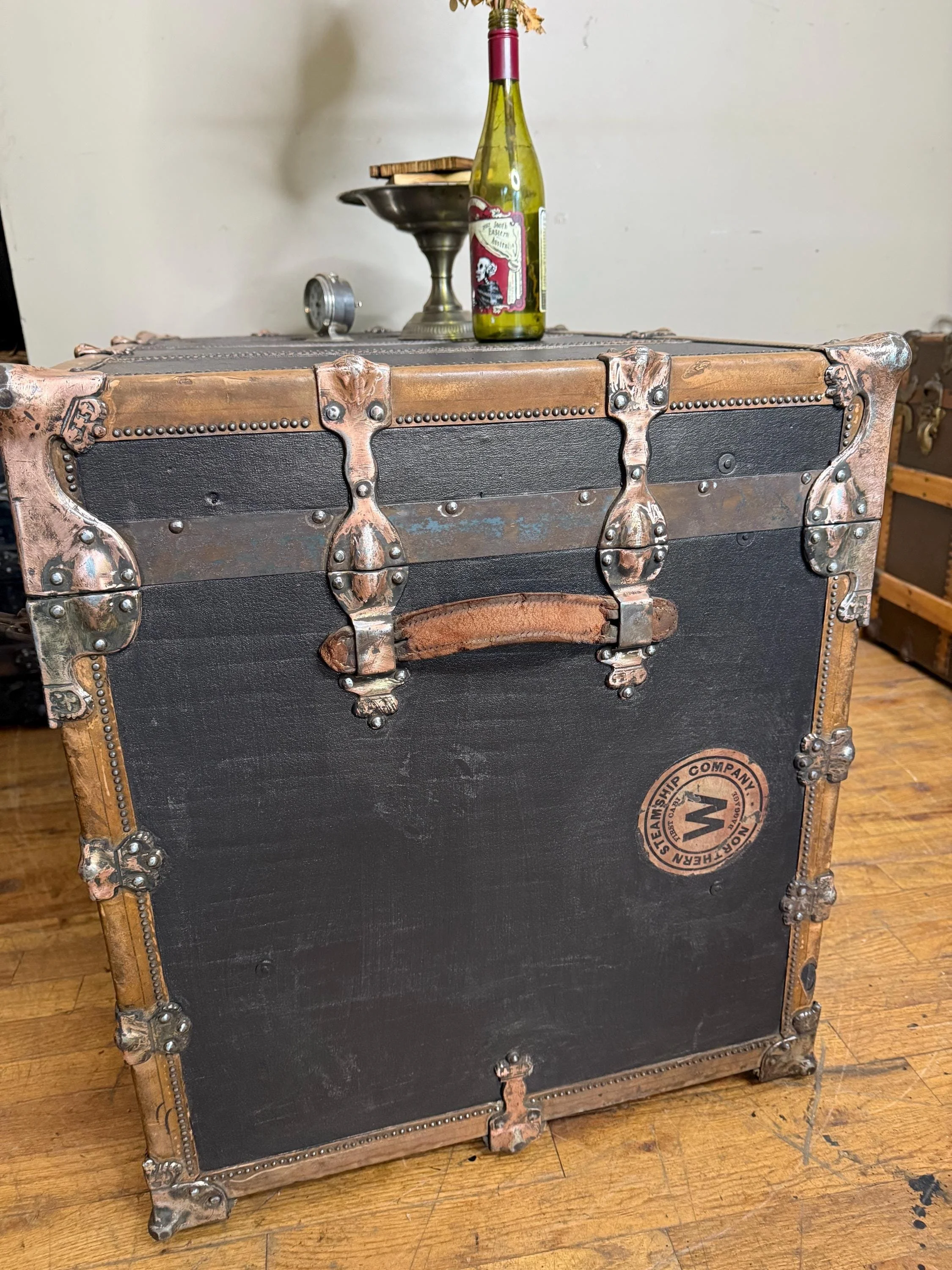 Side profile highlighting the massive scale and durable construction of a 41-inch trunk.