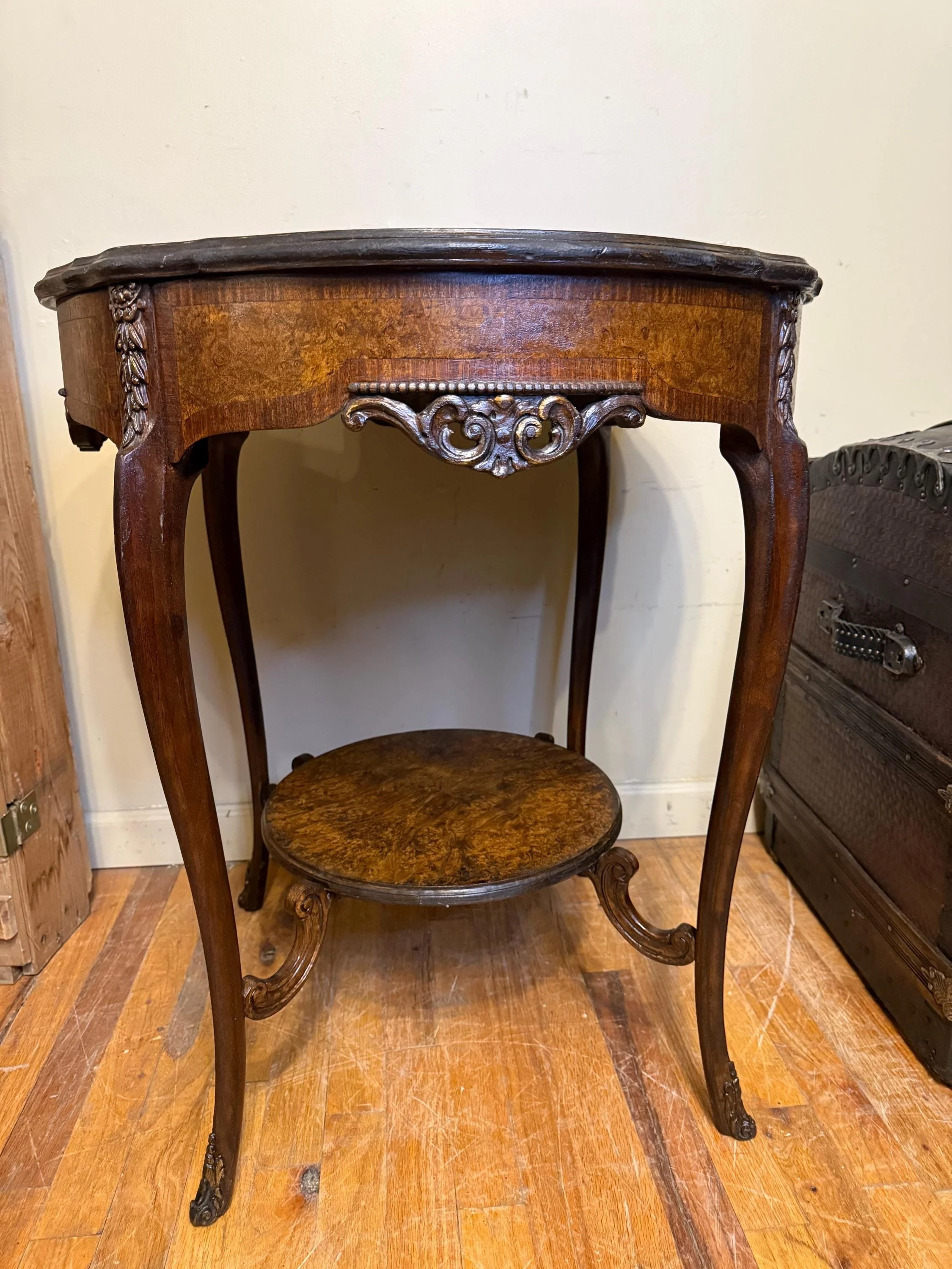 Rare antique burl wood lamp table featuring a unique swirling grain and historical patina.