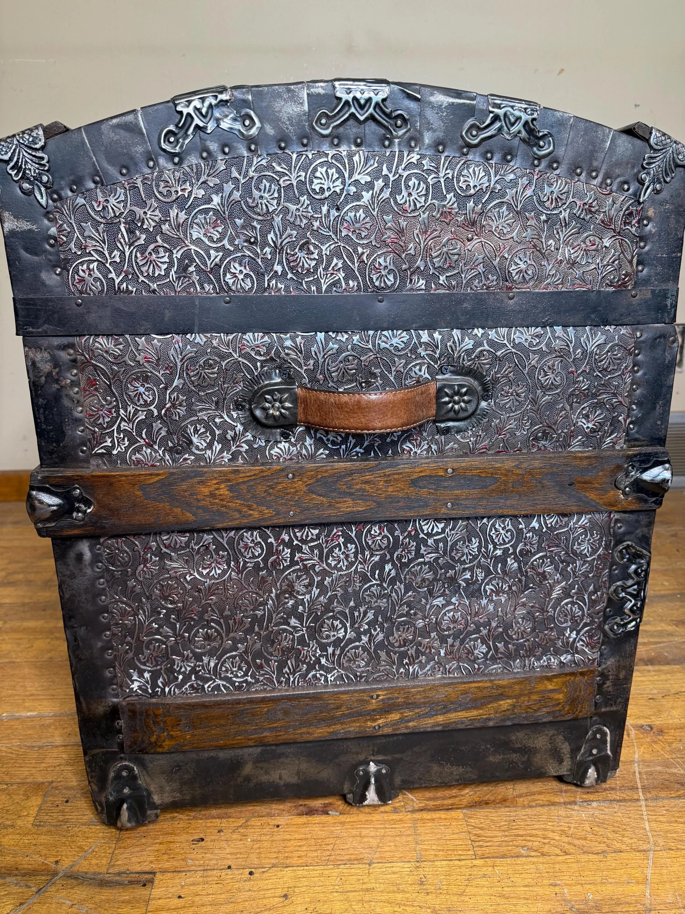 New custom brown leather handles and original corner protectors on an 1800s chest.