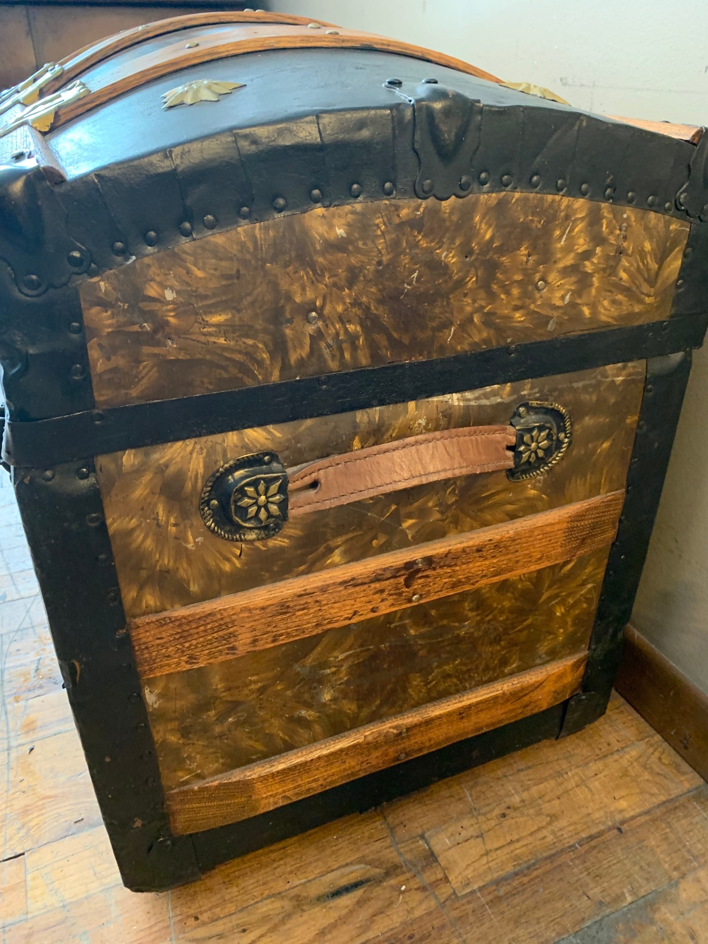 Side profile highlighting the high arched dome lid silhouette of an authentic Victorian treasure chest.