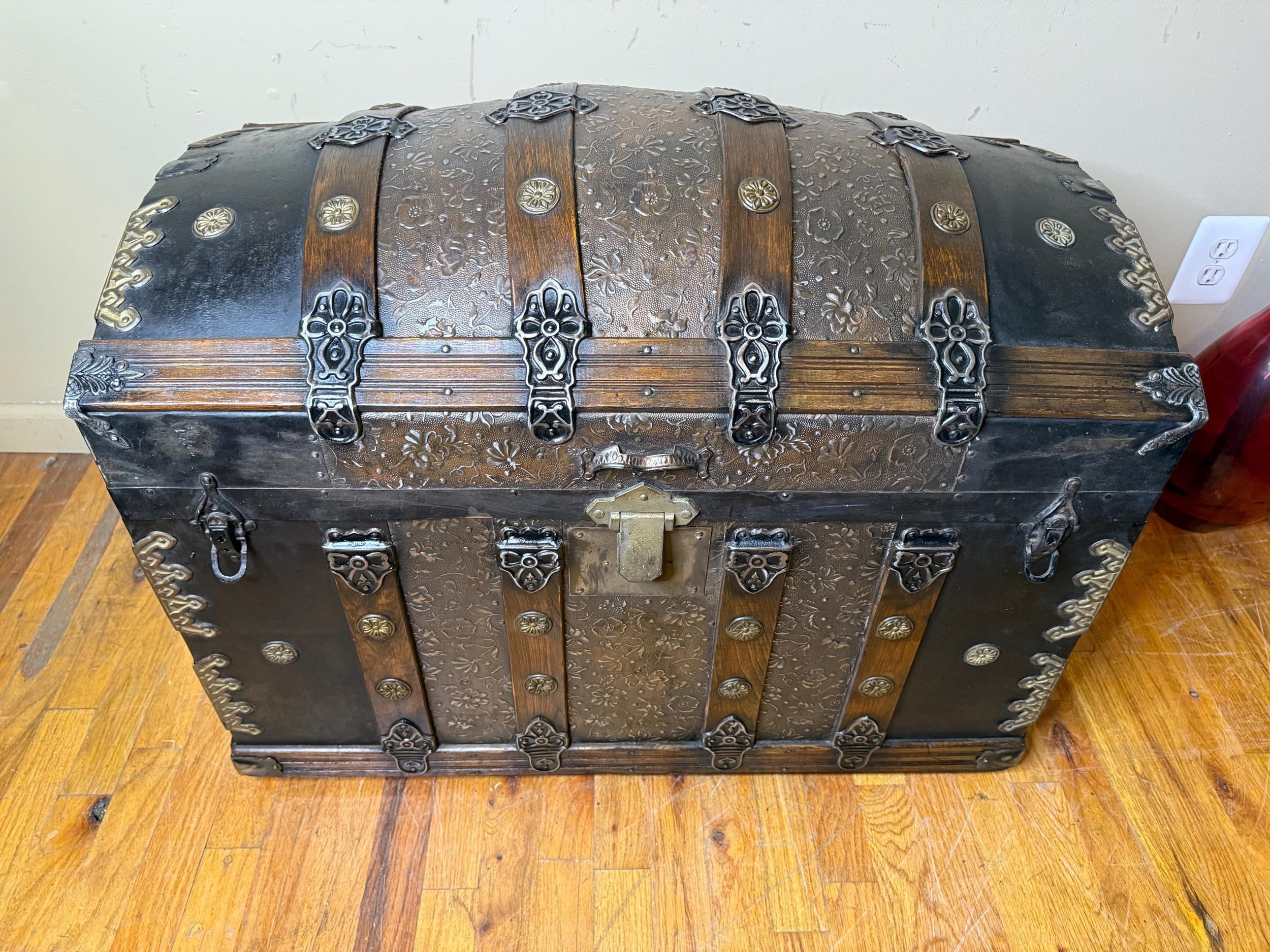Full view of embossed tin panels on rare Victorian trunk