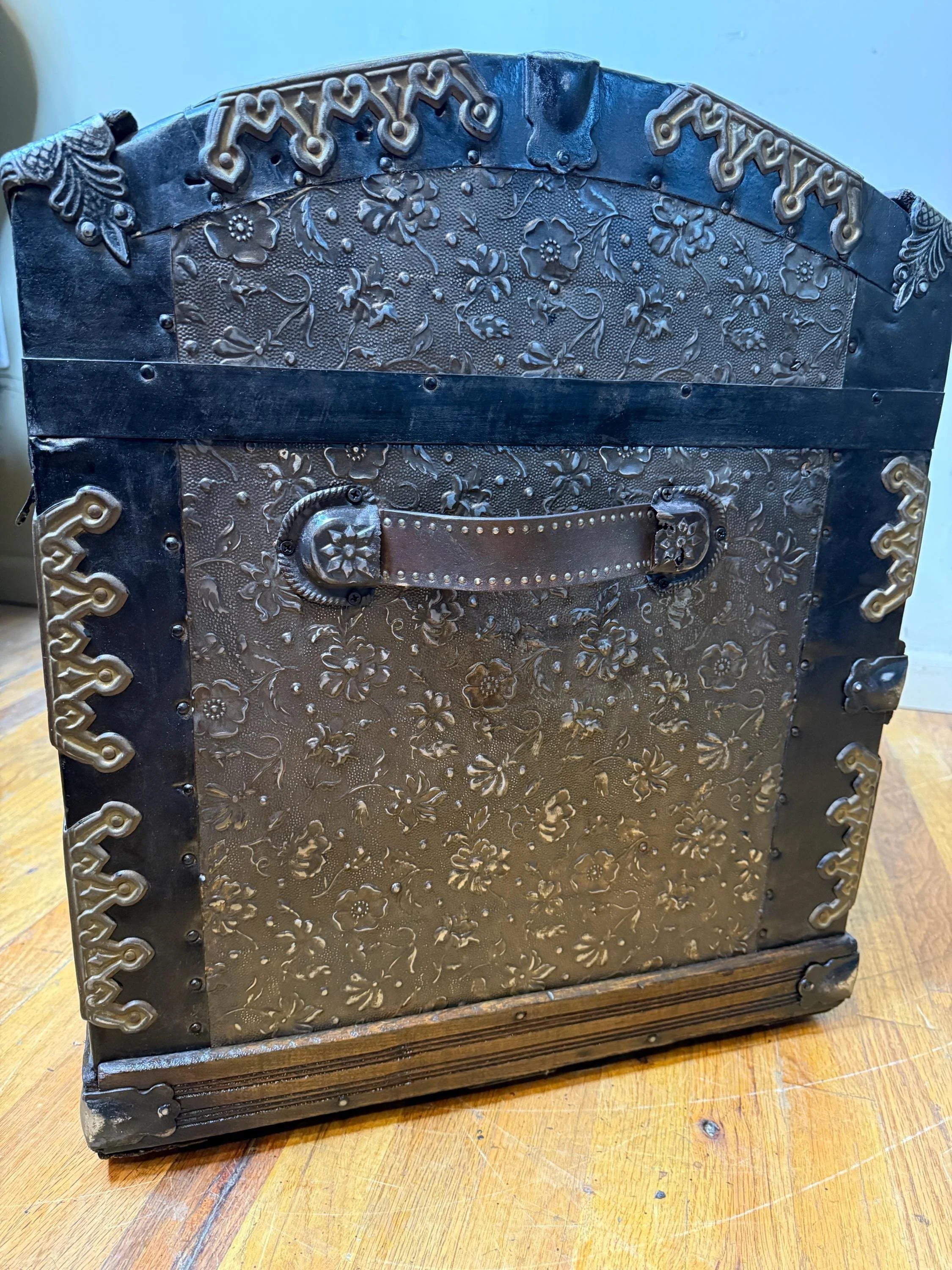 Custom leather handles on humpback steamer trunk