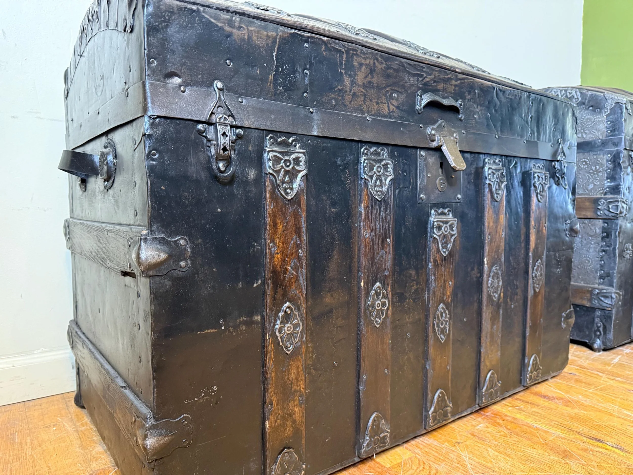 Dome-top vintage travel chest side view