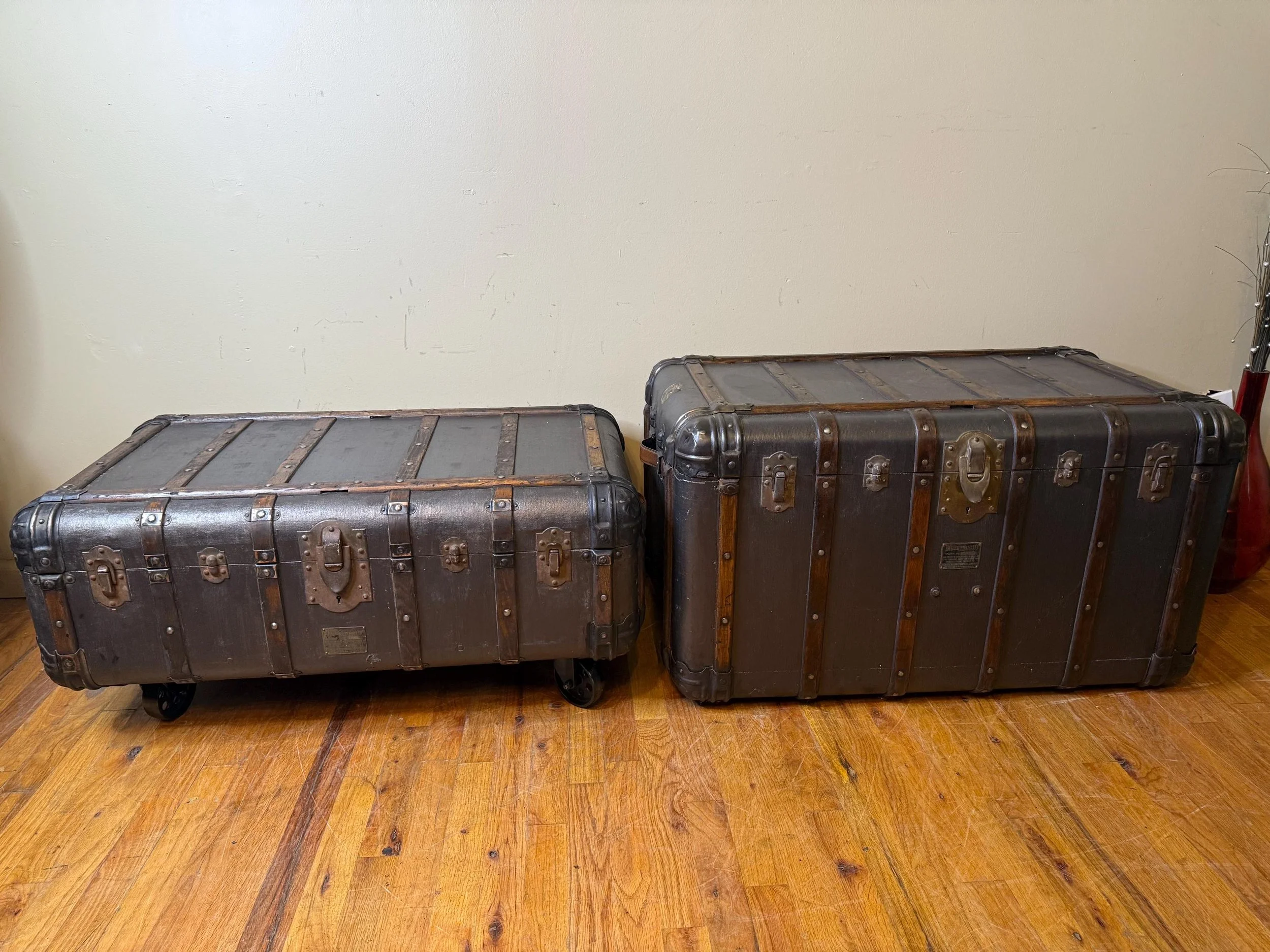 Matching pair of refinished Indestructo steamer trunks