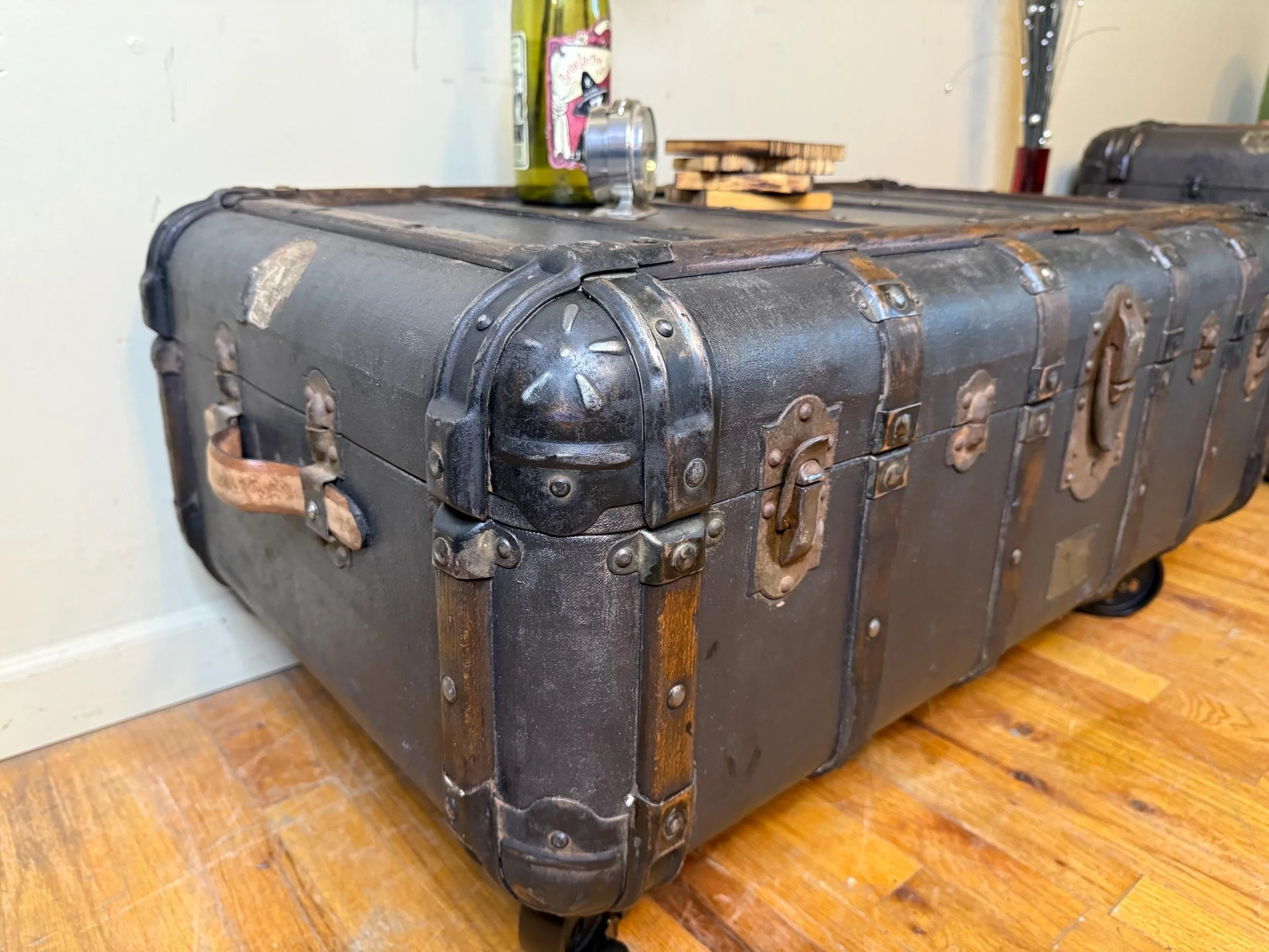 Shorter trunk with swivel lock wheels for mobility