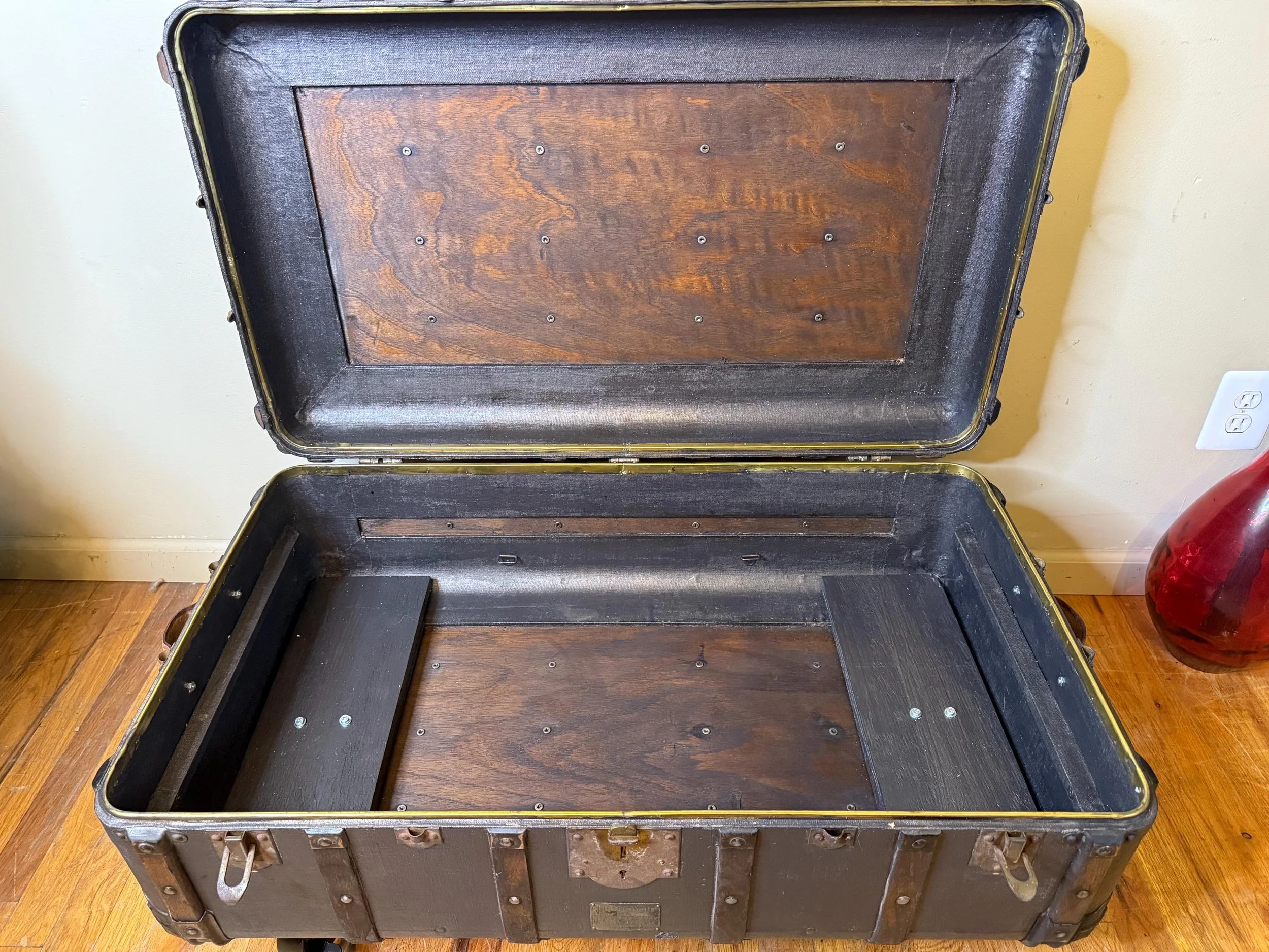 newly refinished interior of a clean, Indestructo travel chest