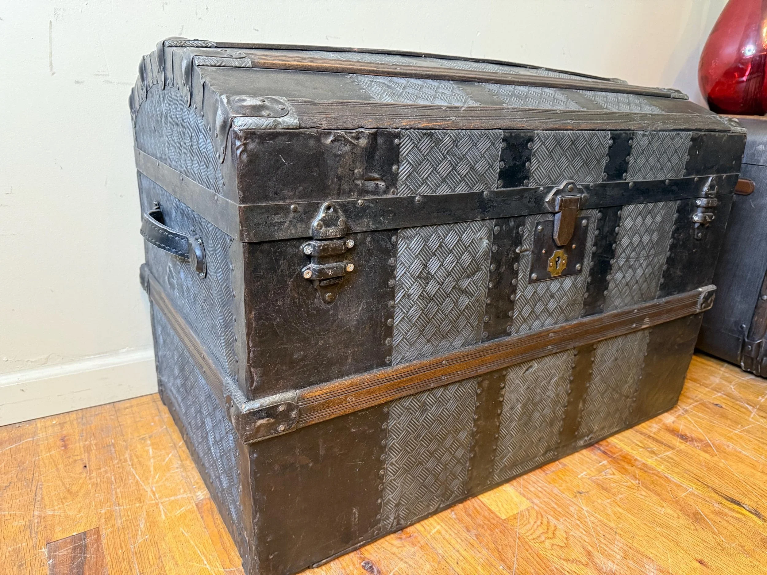 Vintage travel trunk with walnut stained wood slats
