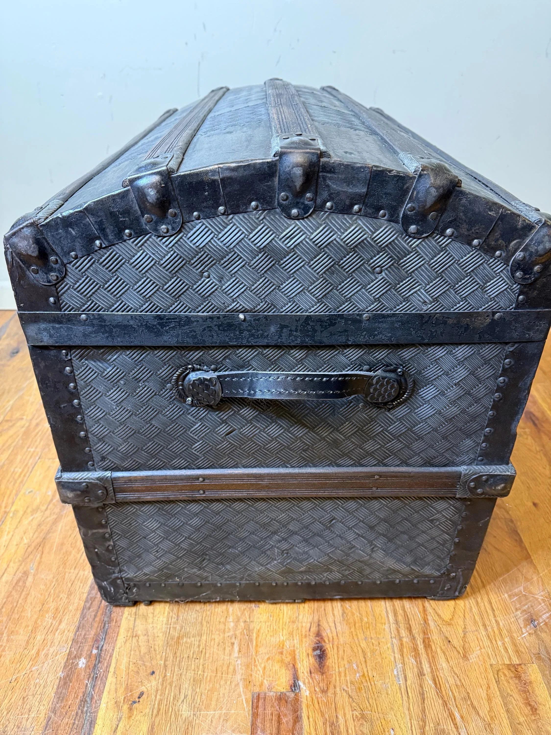 Medium sized vintage steamer trunk with restored exterior