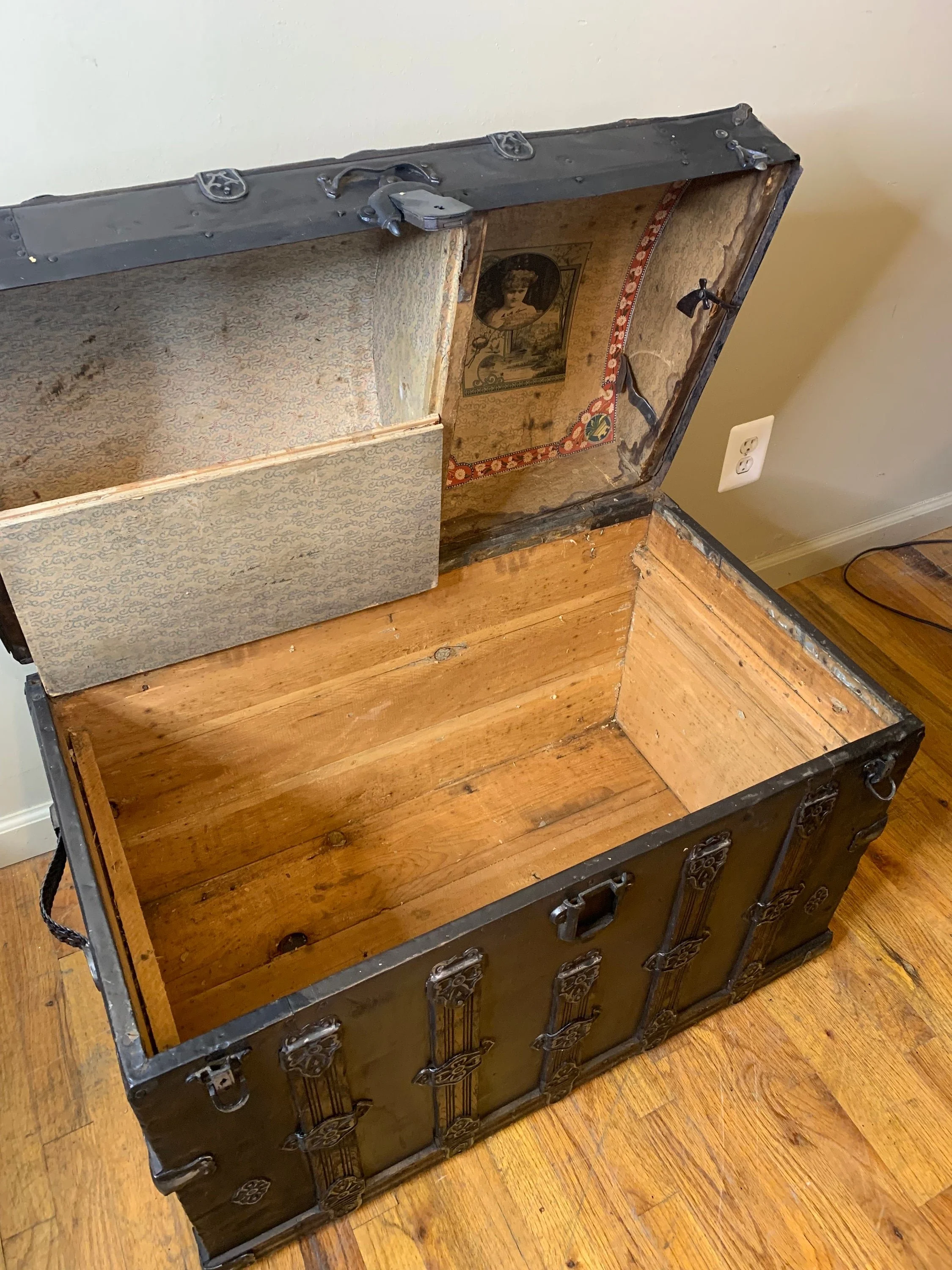 Restored interior of antique Victorian travel trunk