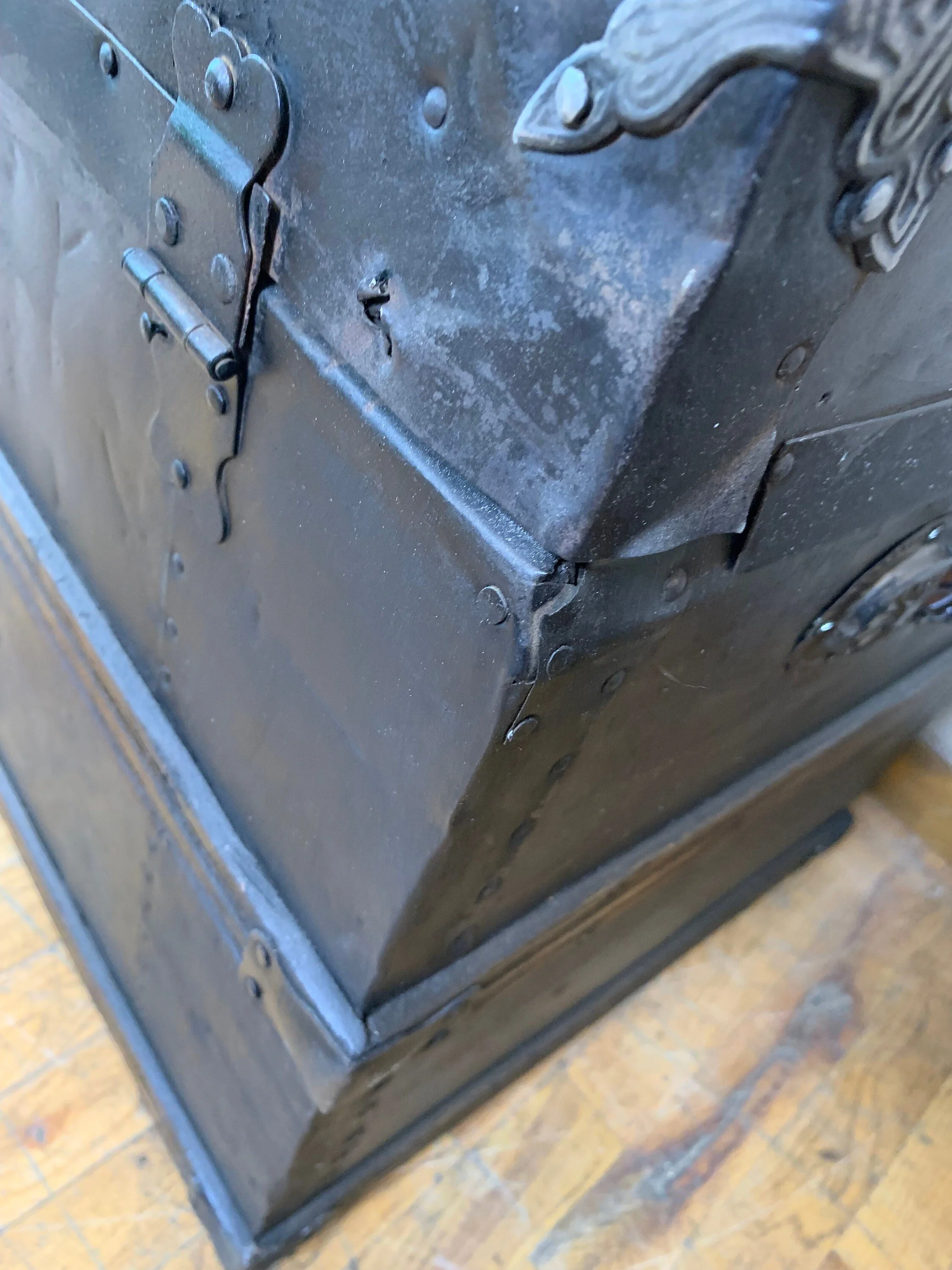 Large antique travel trunk used as decorative vintage home décor piece