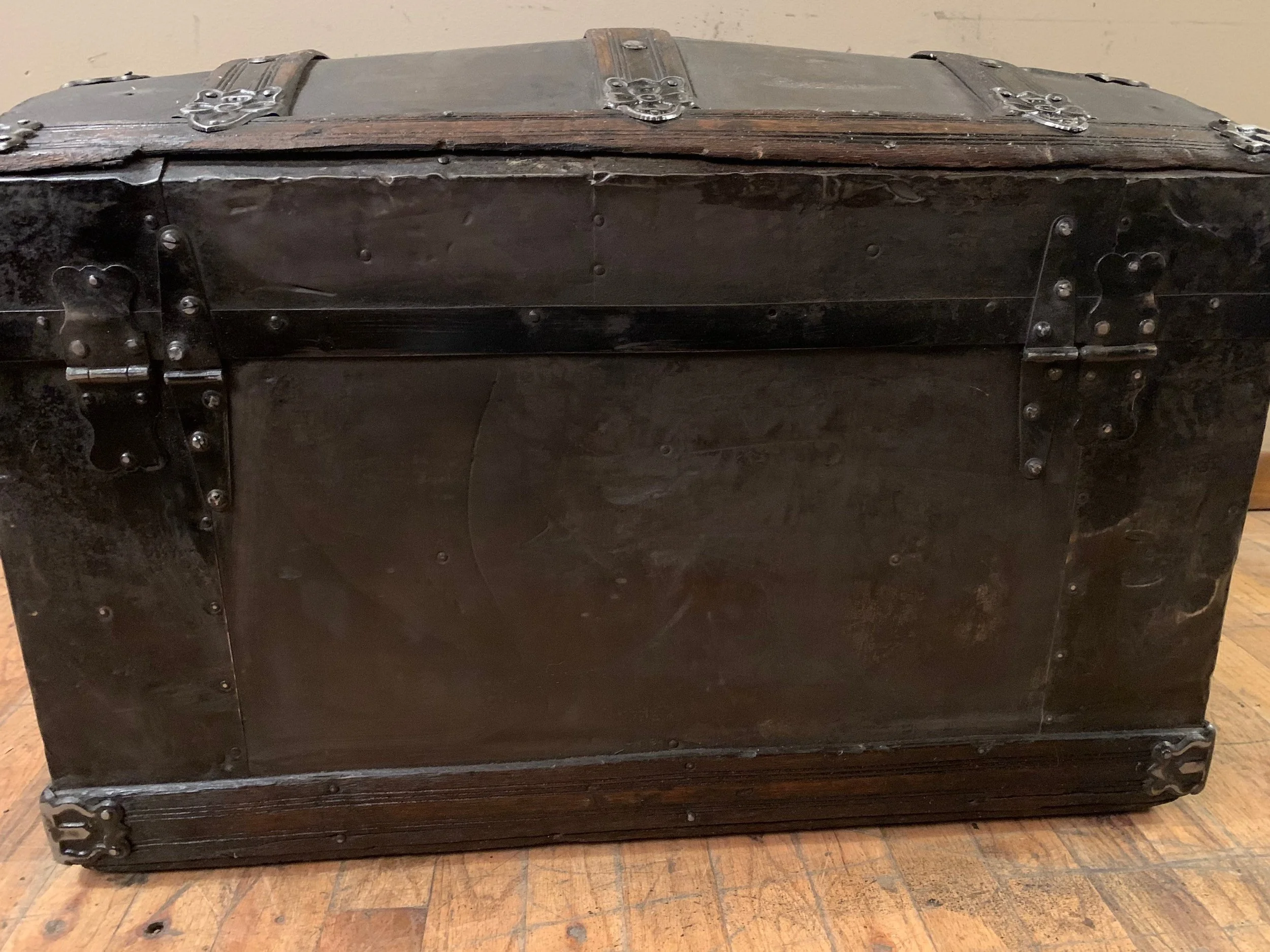 Victorian steamer chest with rich black and brown finish