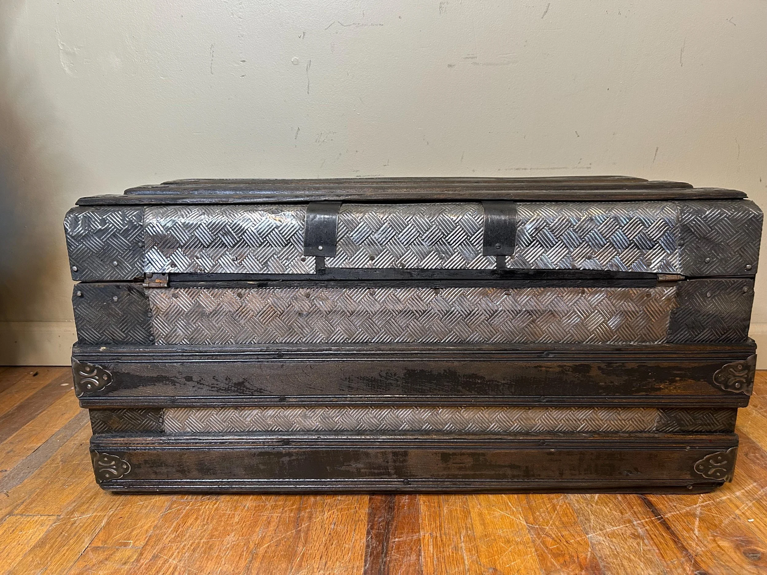 Low antique trunk ideal for use as a coffee table or storage chest