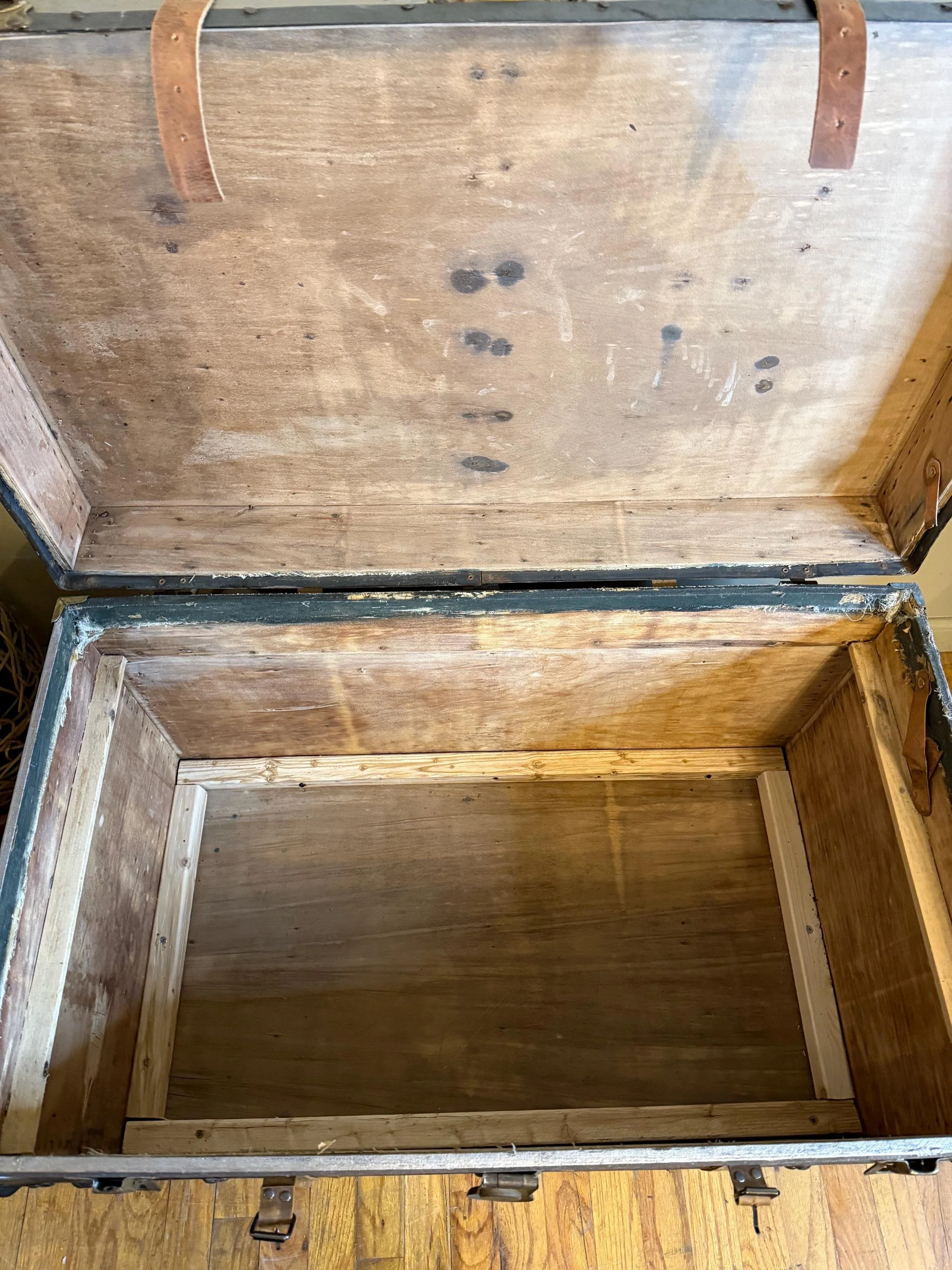 Inside view of a clean, sanded wood interior showing seasoned aged timber character