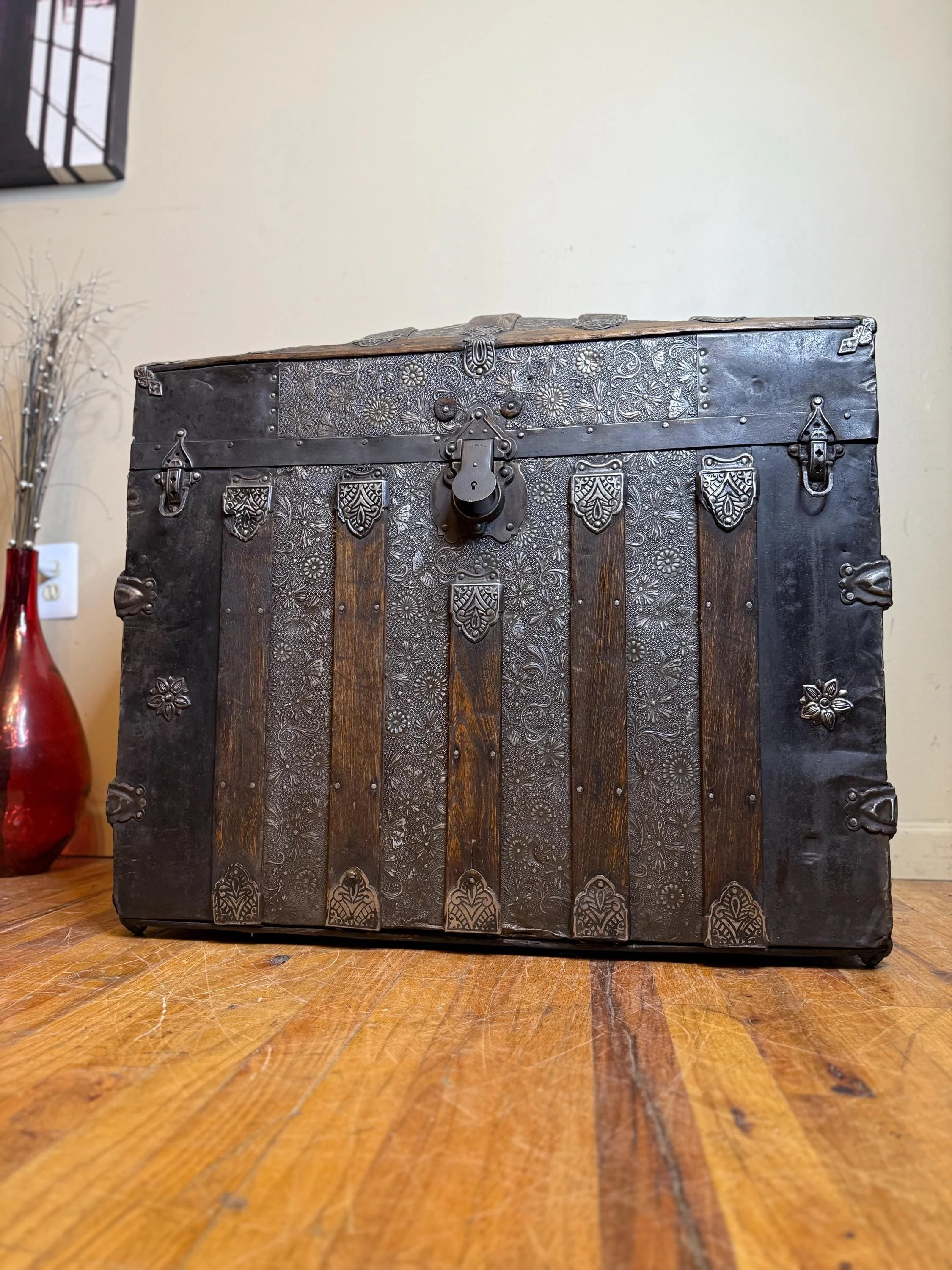 Large Victorian Saratoga style humpback treasure chest with refinished floral tin