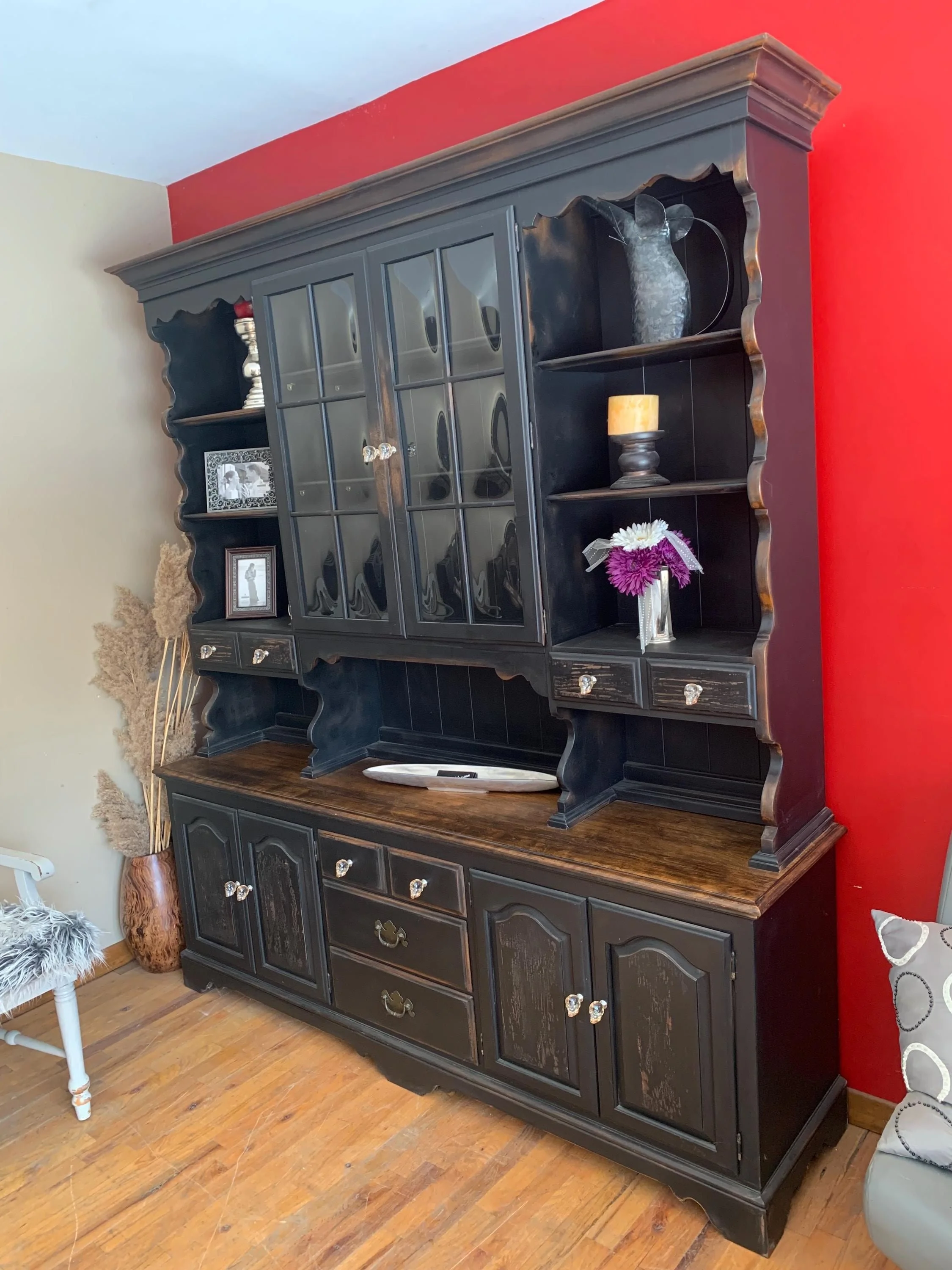 Walnut stained top on distressed black cabinet
