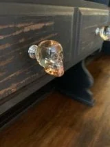 Decorative skull glass knobs on buffet