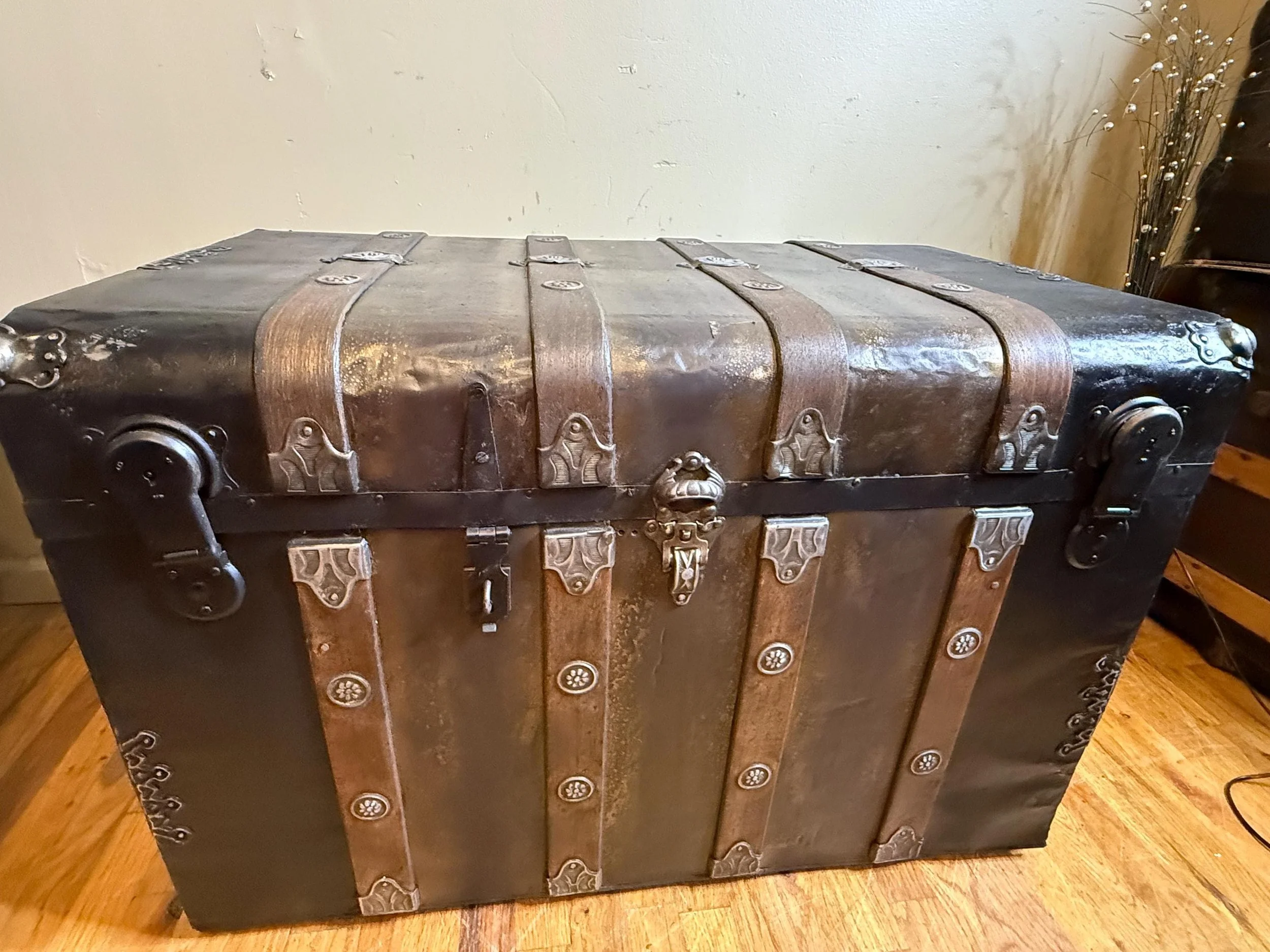 Antique steamer trunk used as coffee table