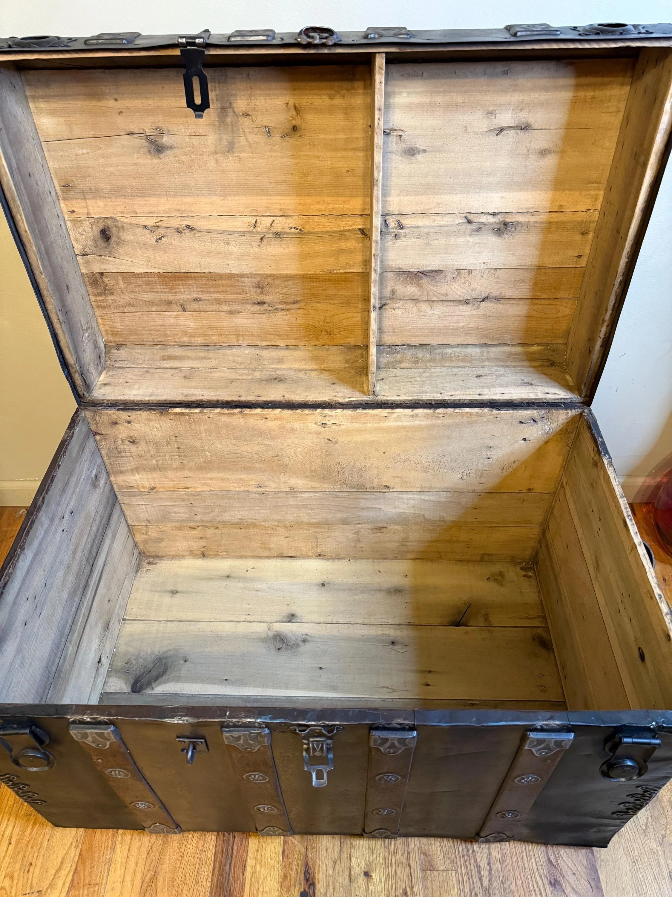 Interior of restored antique storage trunk