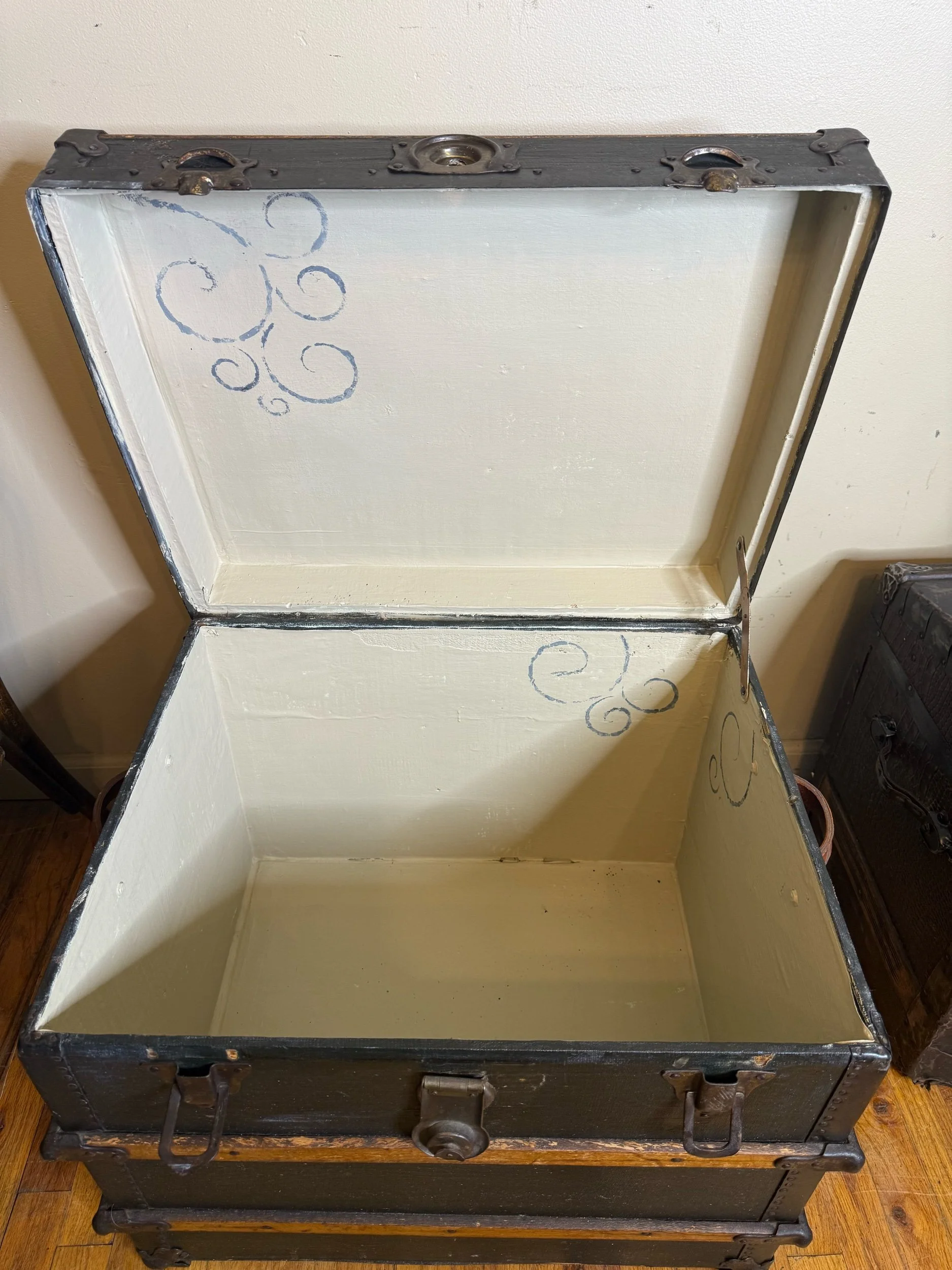 Authentic early 1900s steamer trunk with vintage character