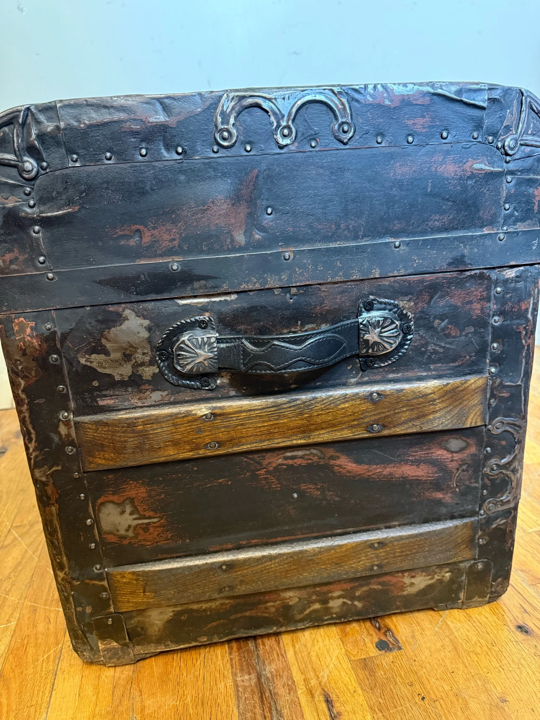 Vintage travel trunk with restored hardware and custom handles