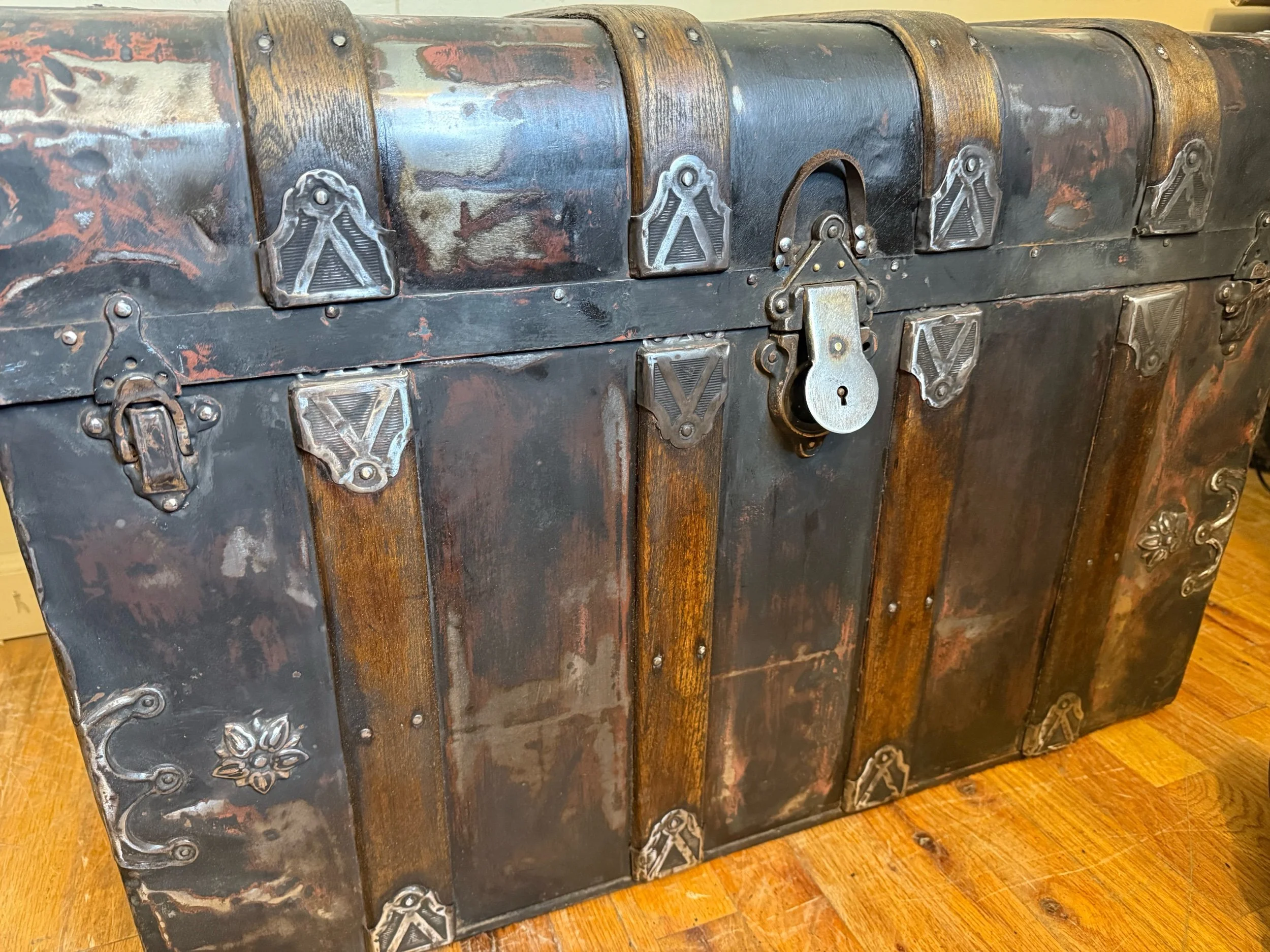 Antique wood and tin storage chest with refinished exterior