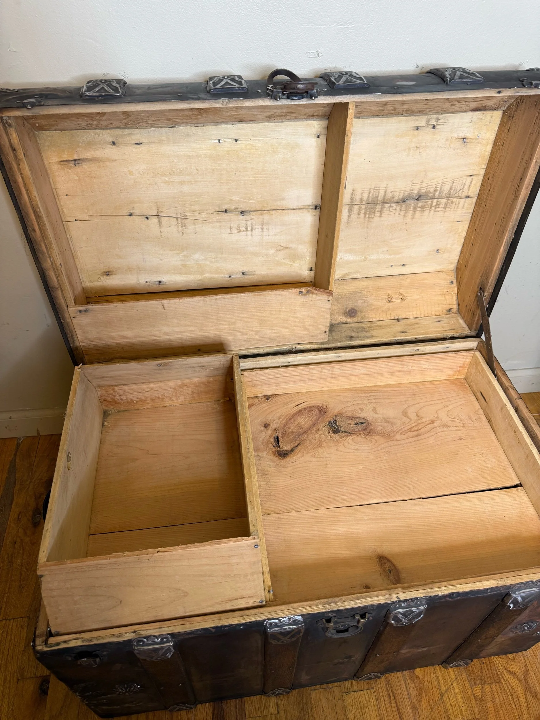 Refinished antique storage chest with original tray insert