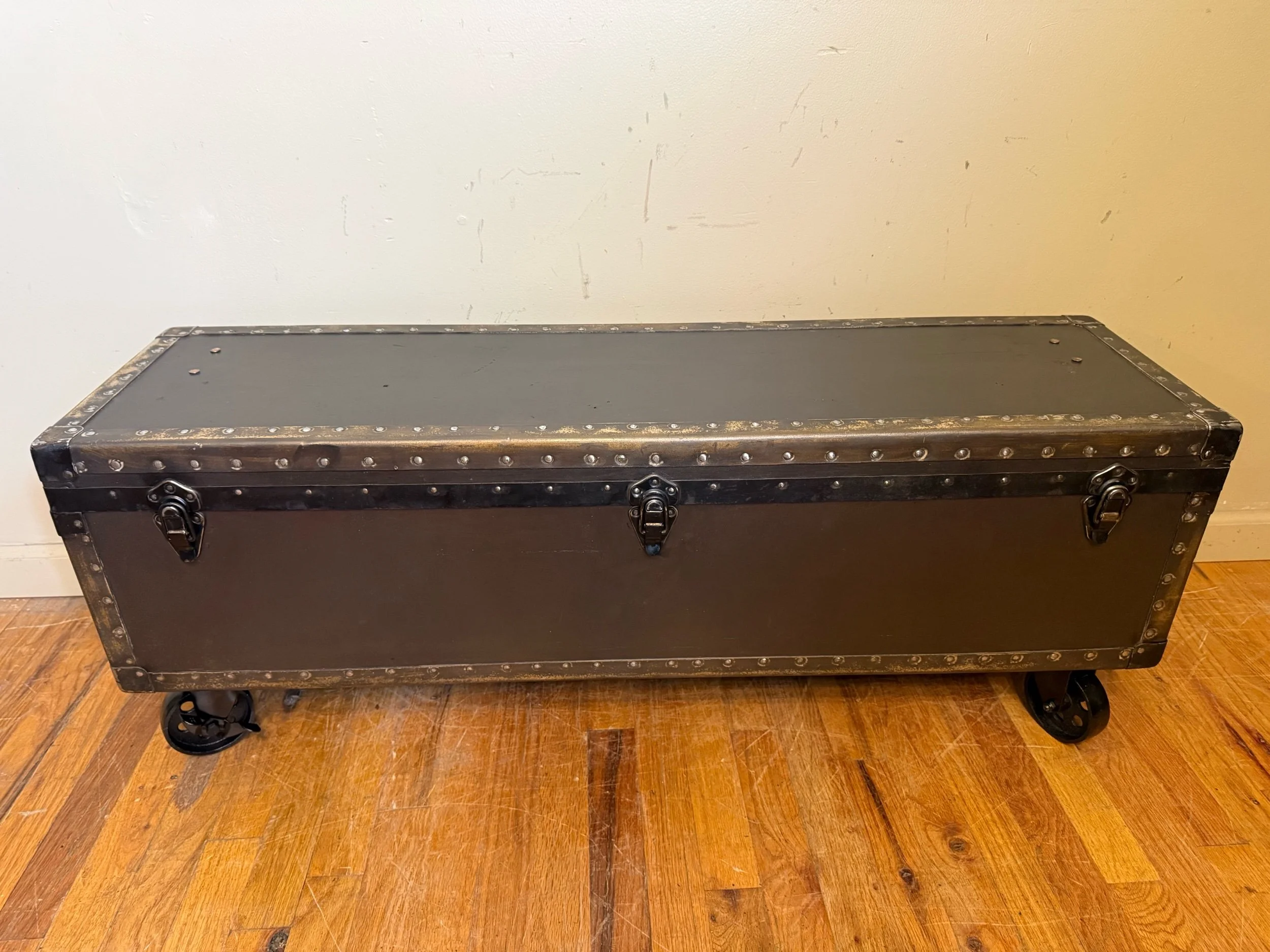 Refinished antique trunk chest with deep iridescent brown finish