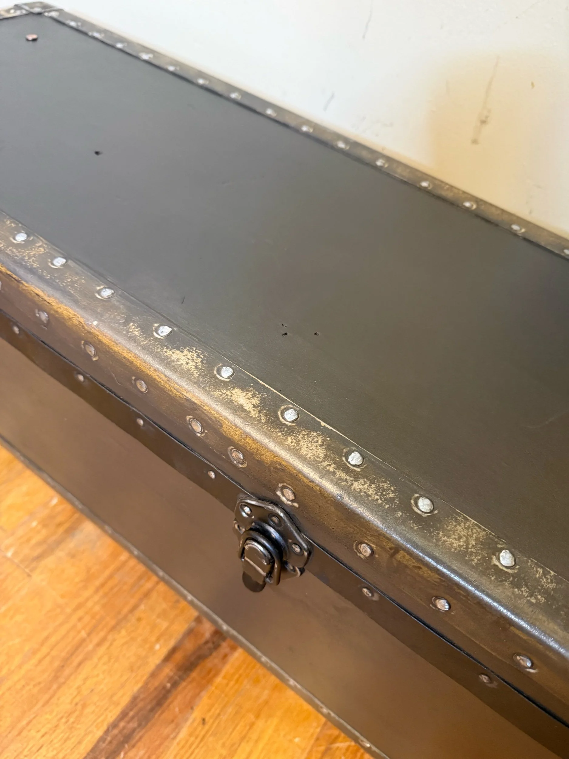 Rustic vintage storage trunk with rich brown refinished exterior