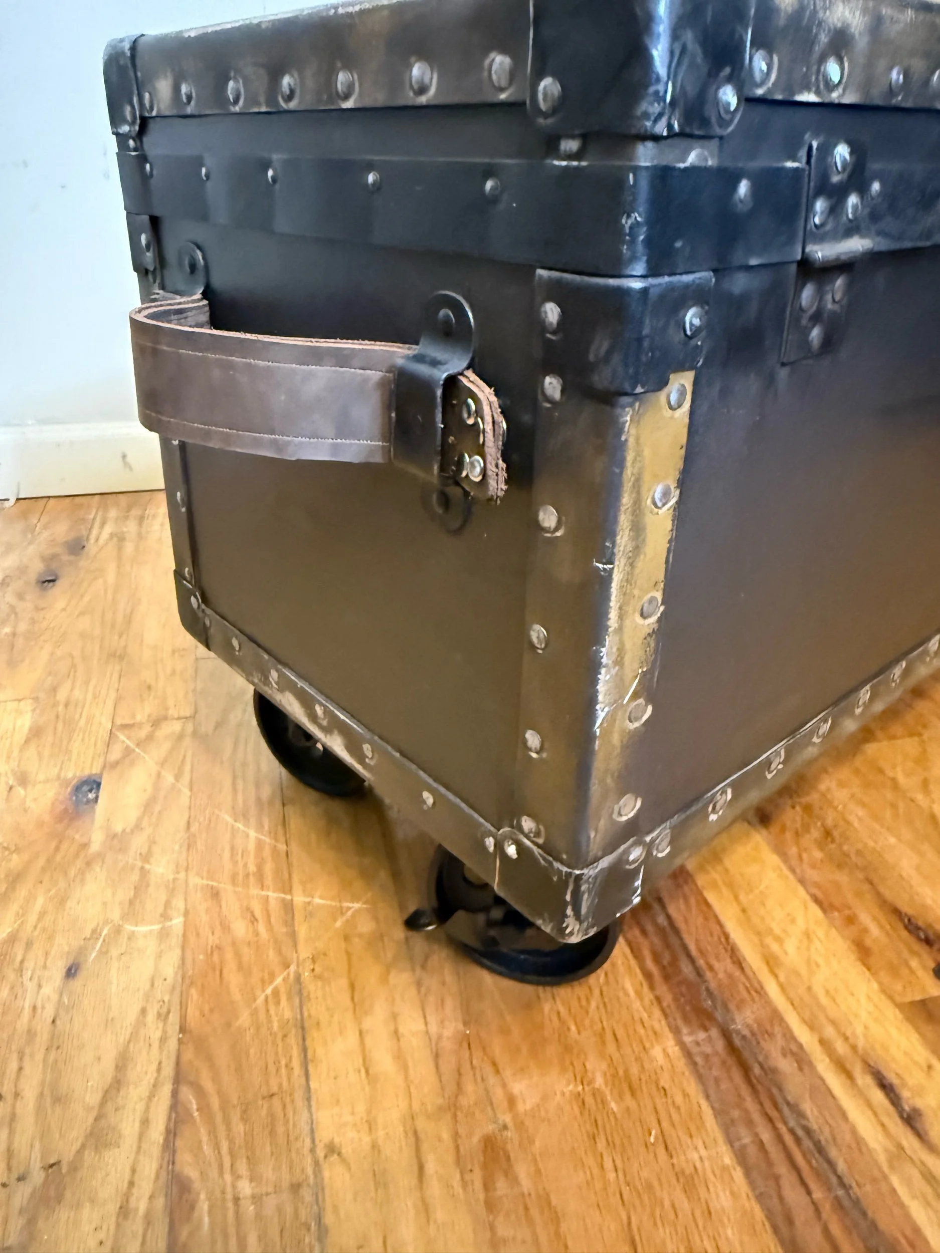 Antique coffee table trunk styled for living room storage