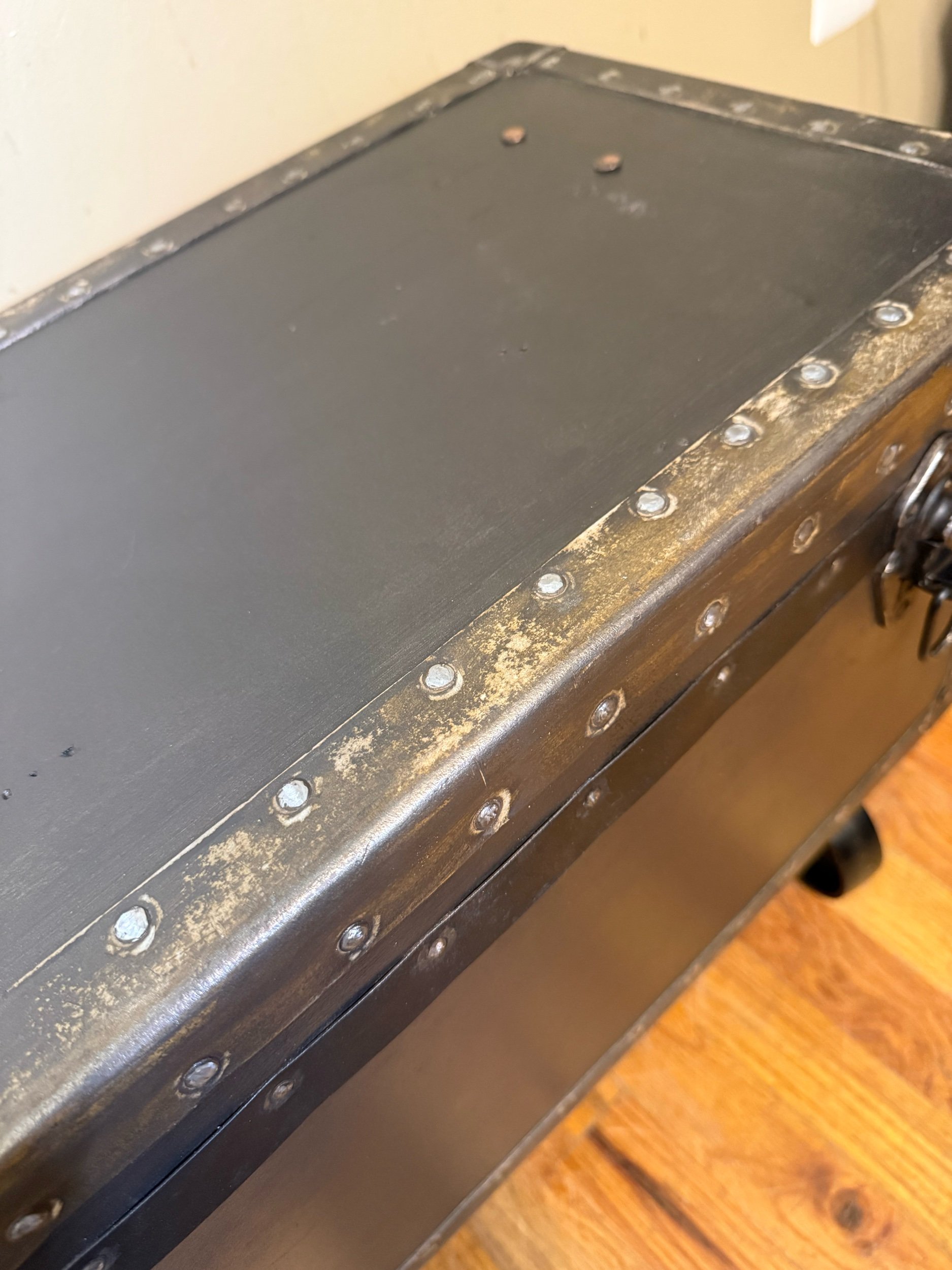 Vintage trunk chest with locking caster wheels for easy movement
