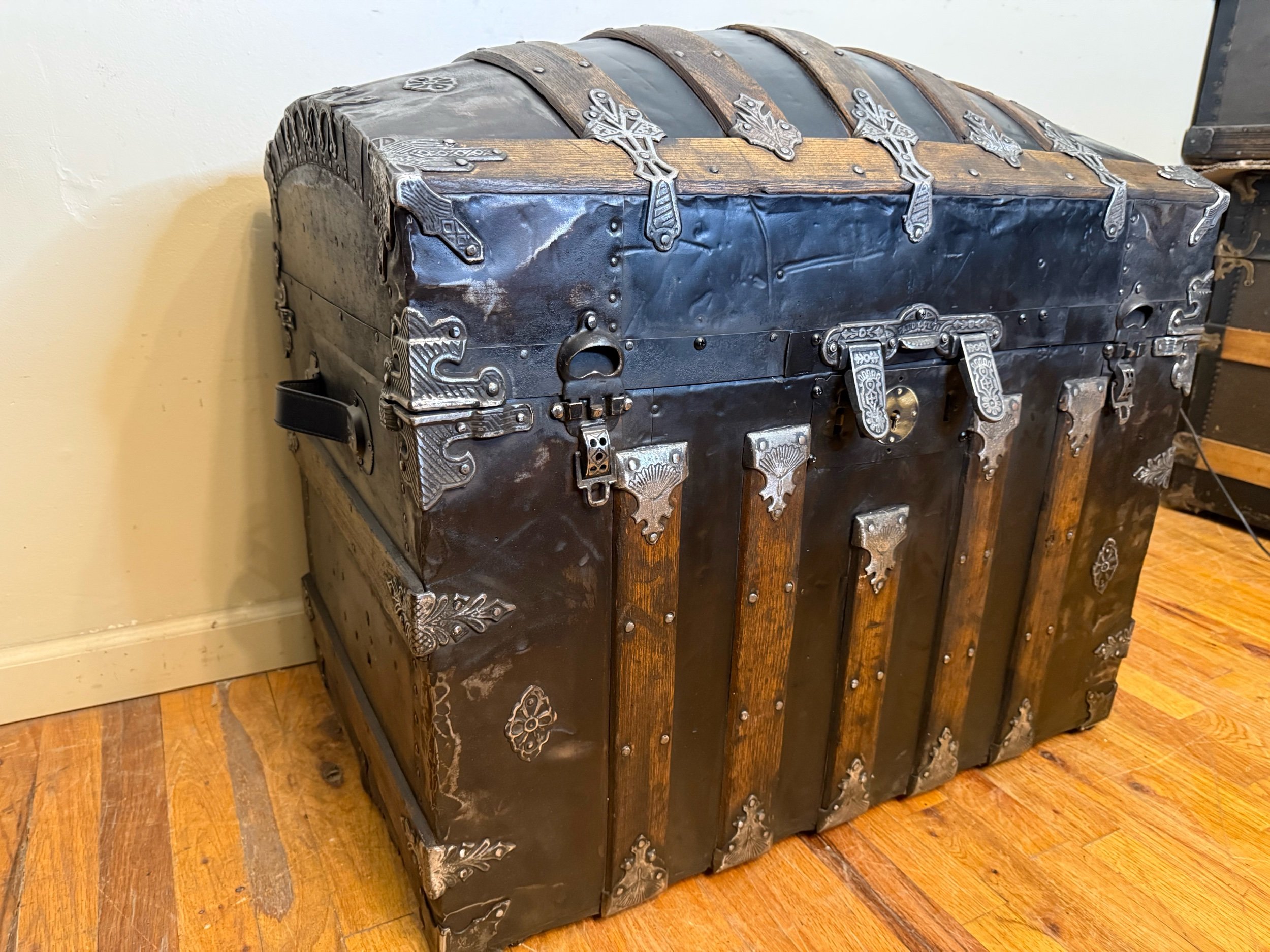 Dome top Saratoga trunk with ornate original hardware