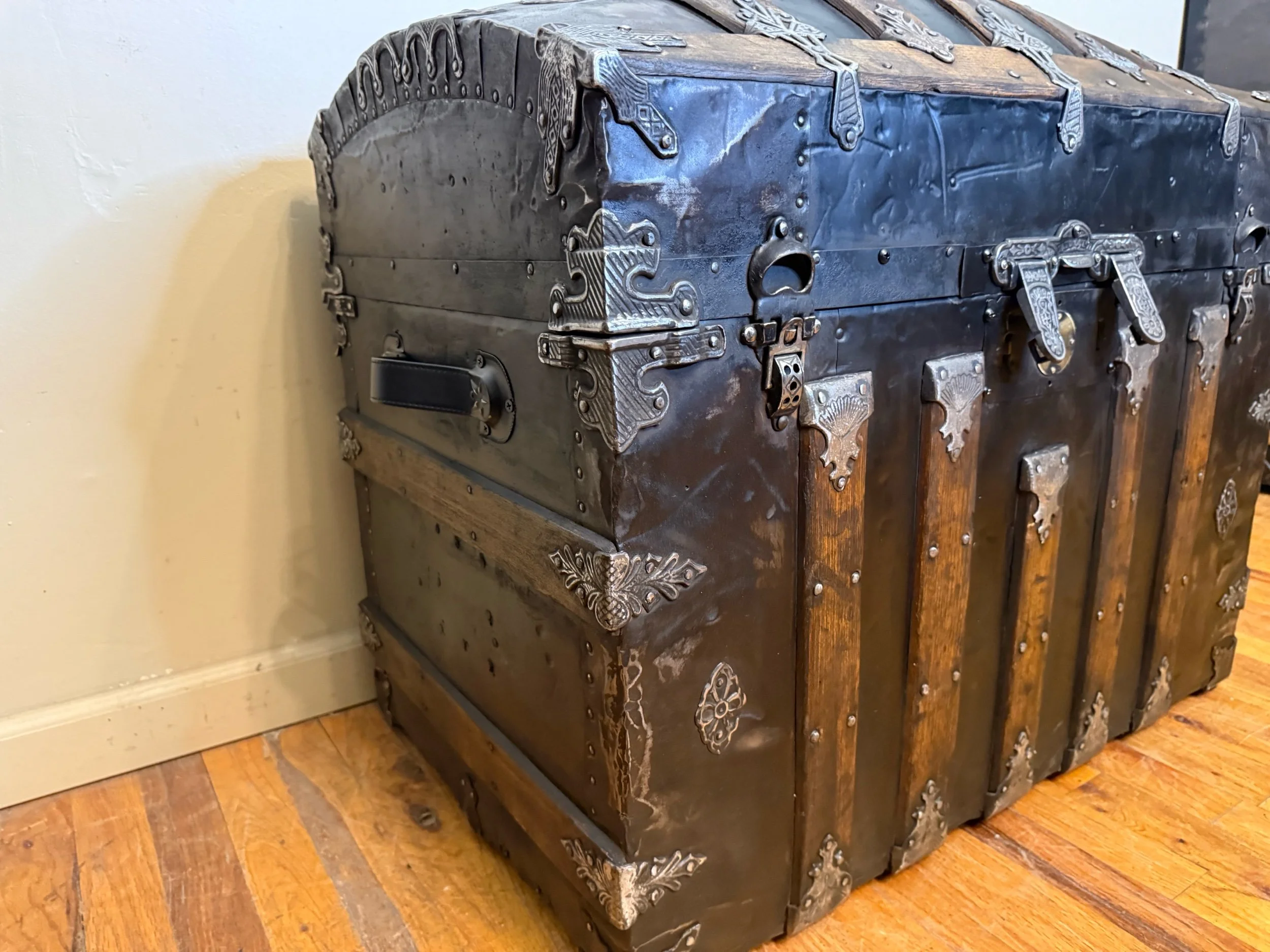 Antique blanket chest with dome top design