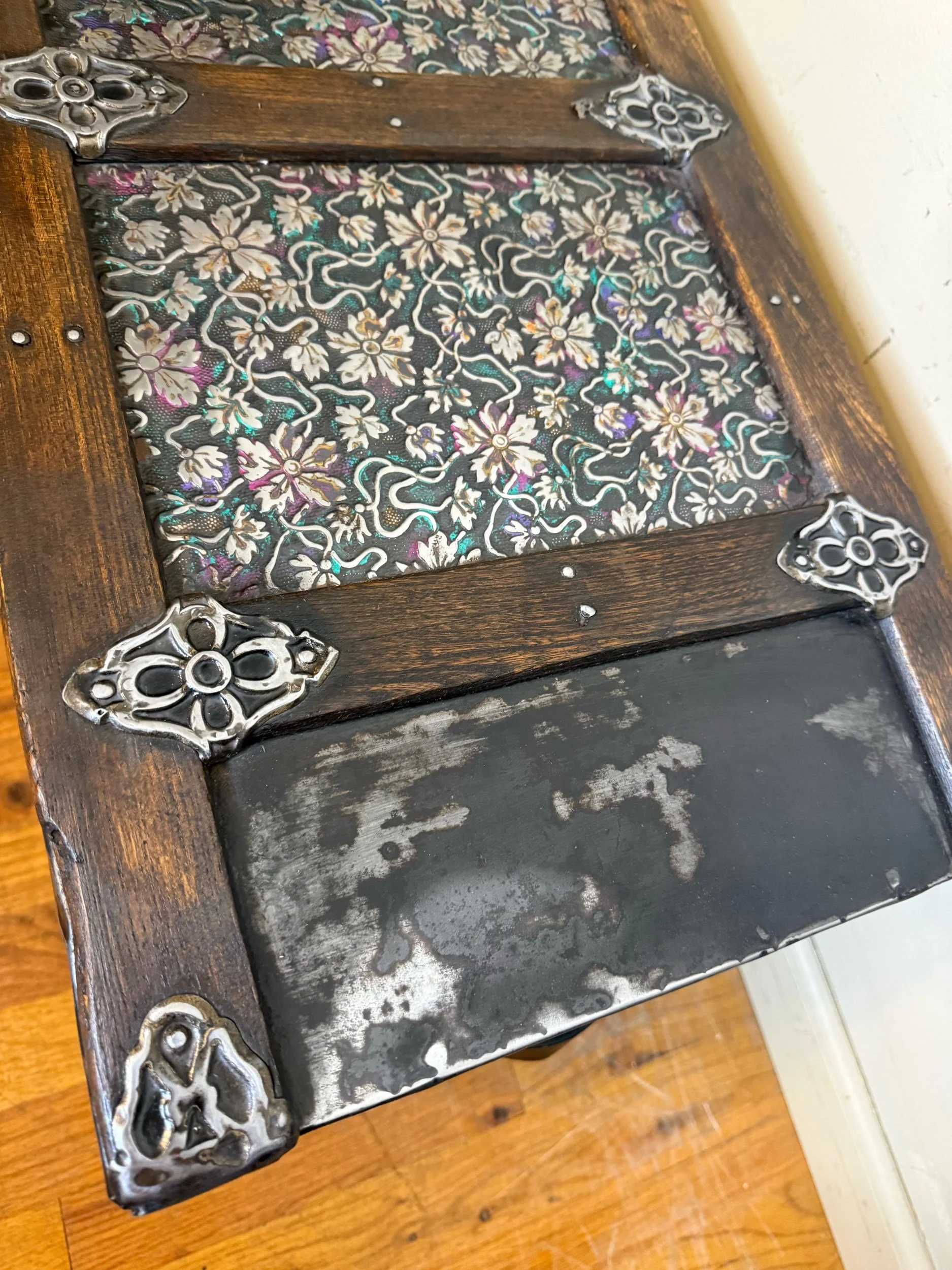 Rare embossed tin storage chest with custom leather handles