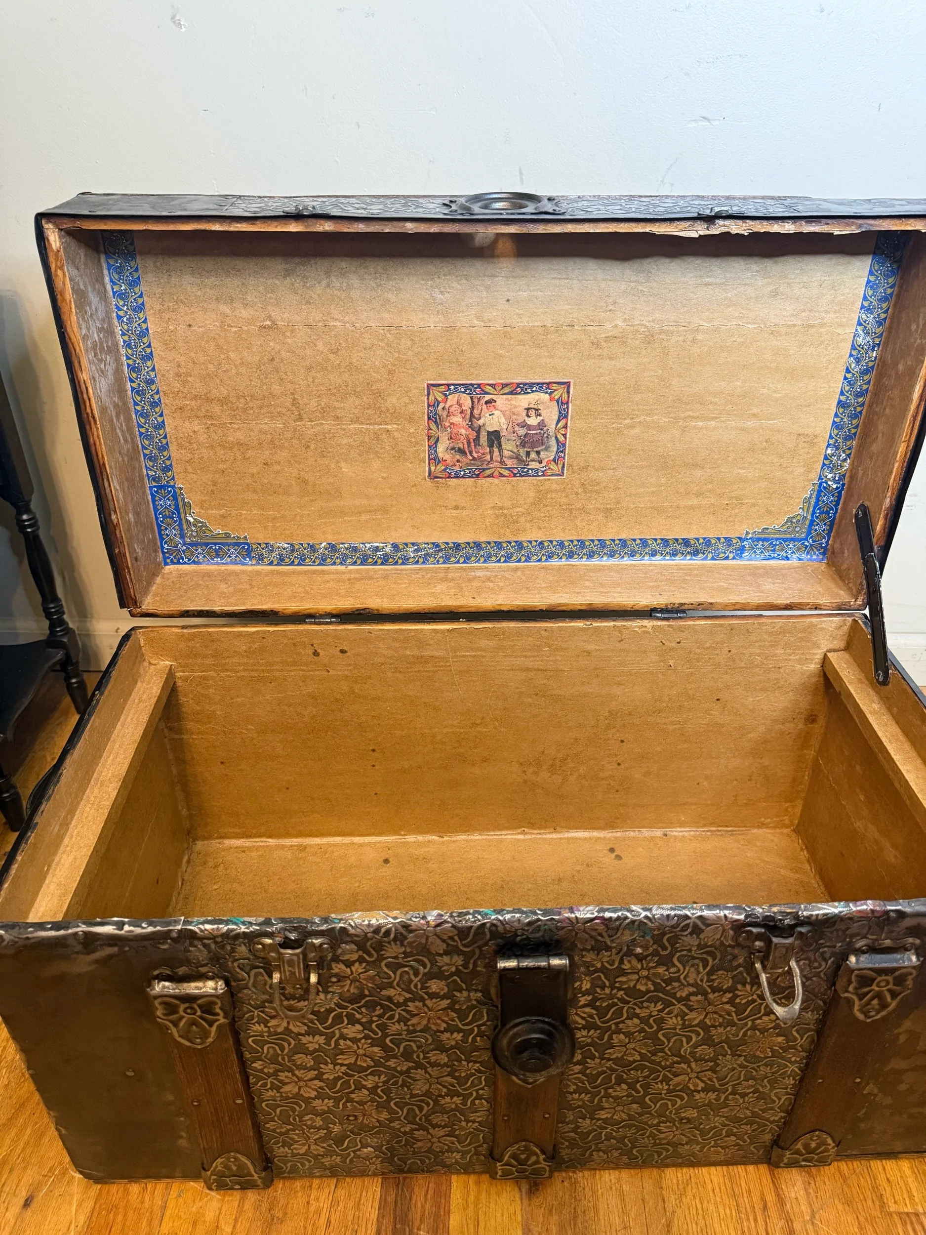 One-of-a-kind embossed tin Victorian travel trunk