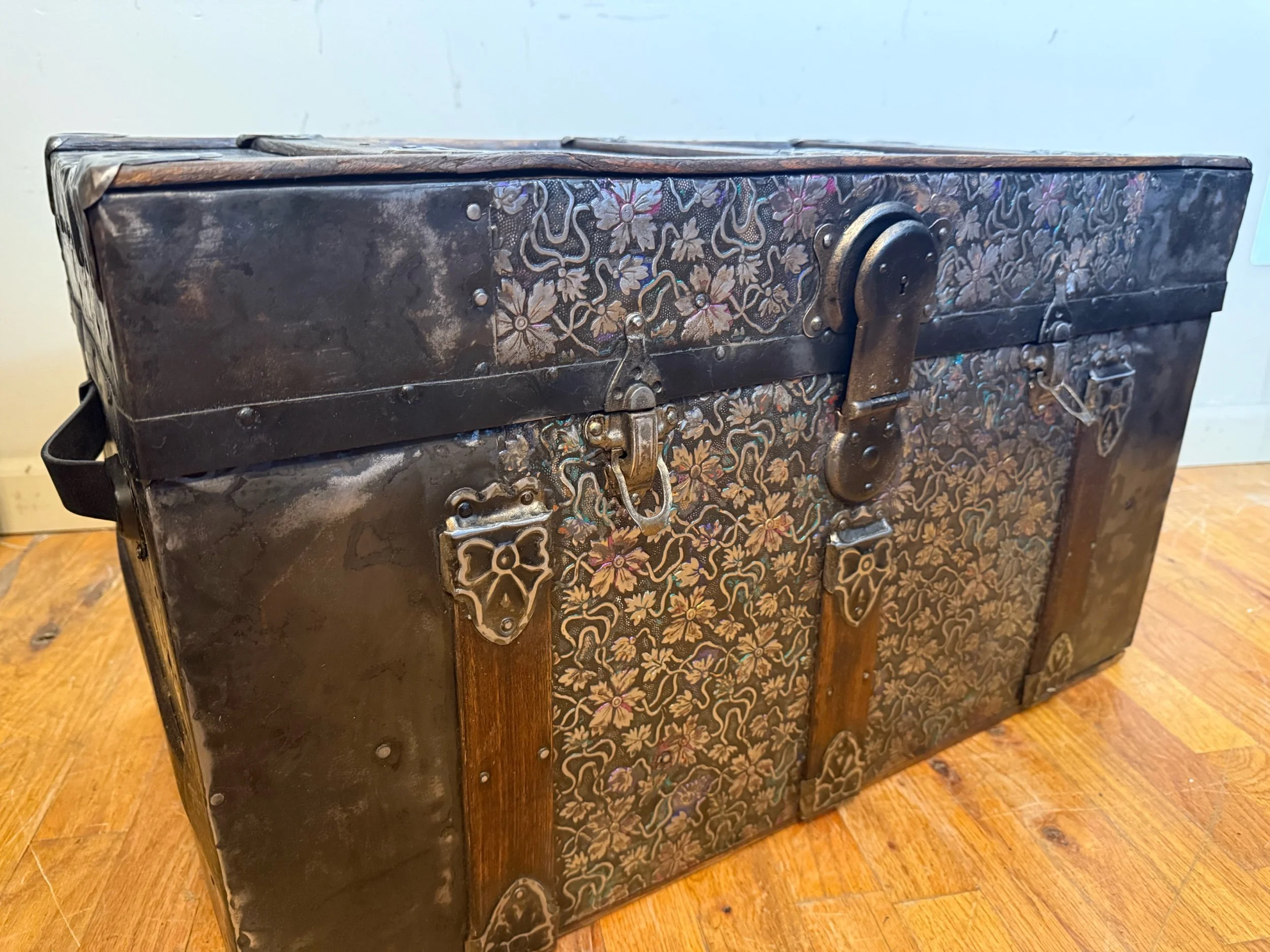 Antique blanket chest with rare embossed tin exterior