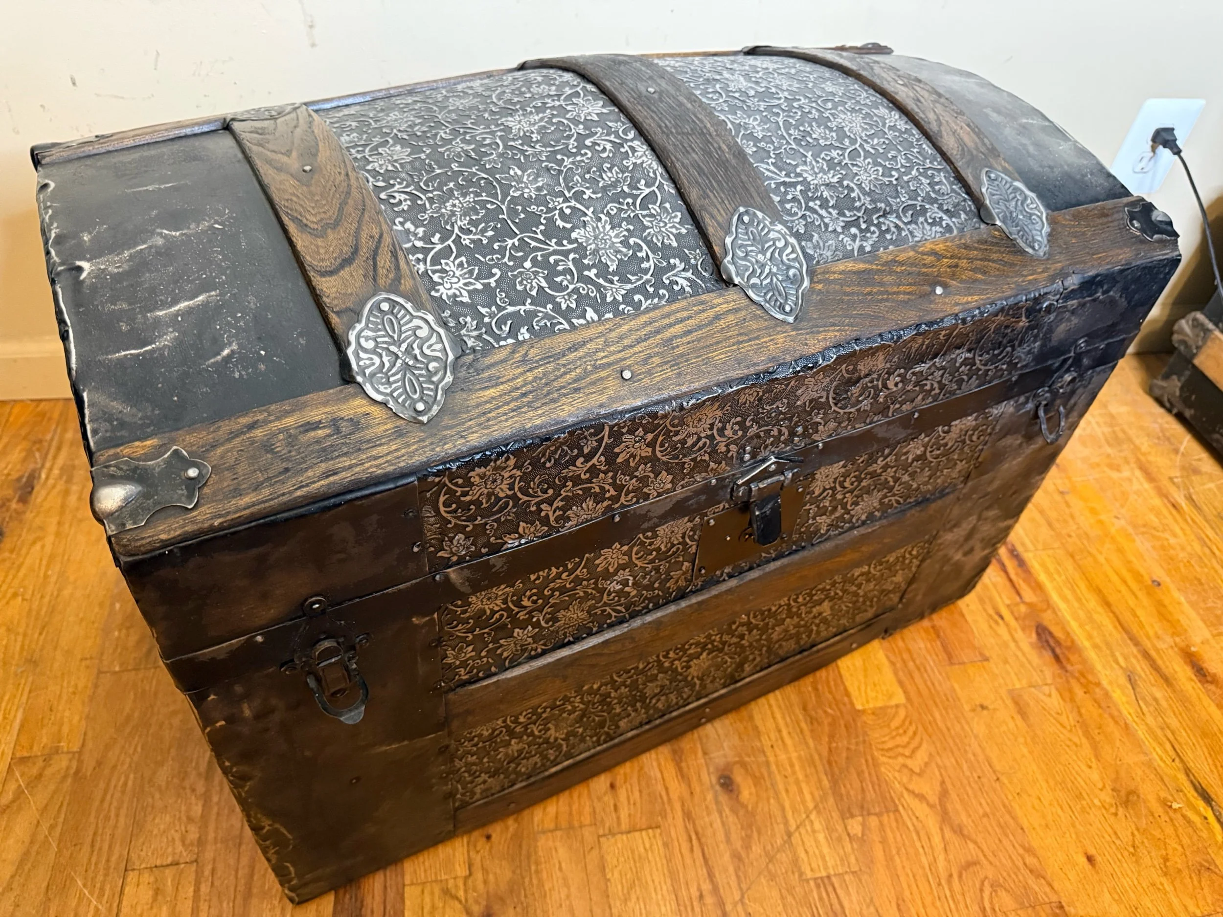 Embossed tin antique storage chest with walnut oak slats