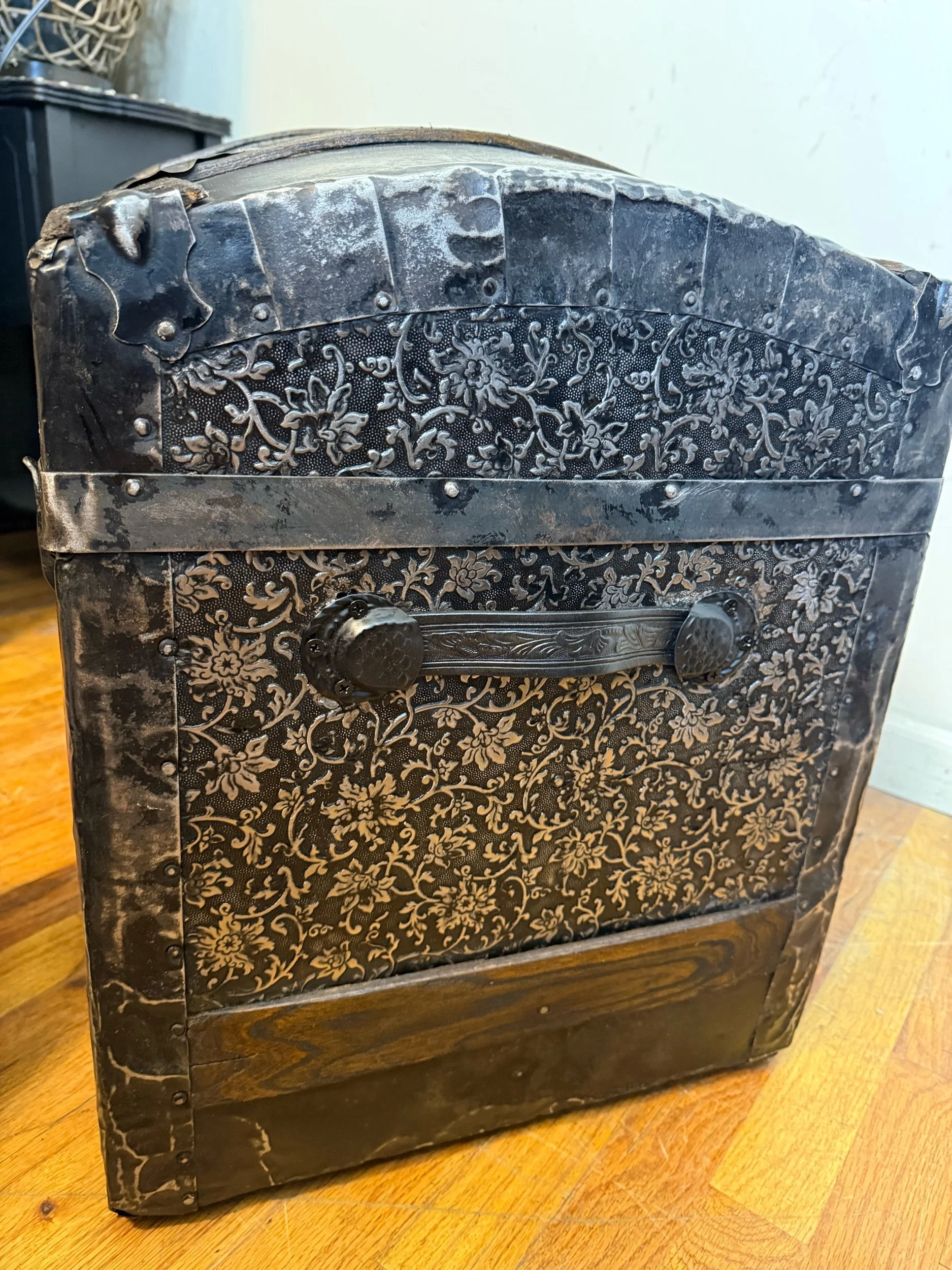 Side view of Victorian humpback steamer trunk