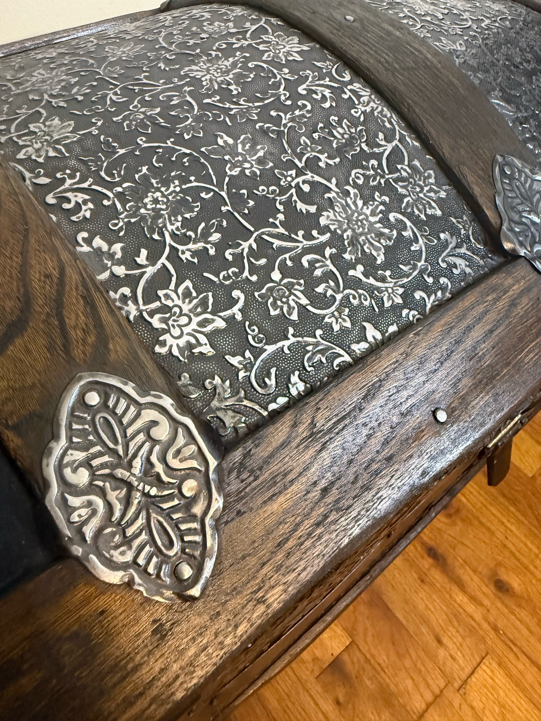 Close-up of embossed tin pattern on Saratoga trunk