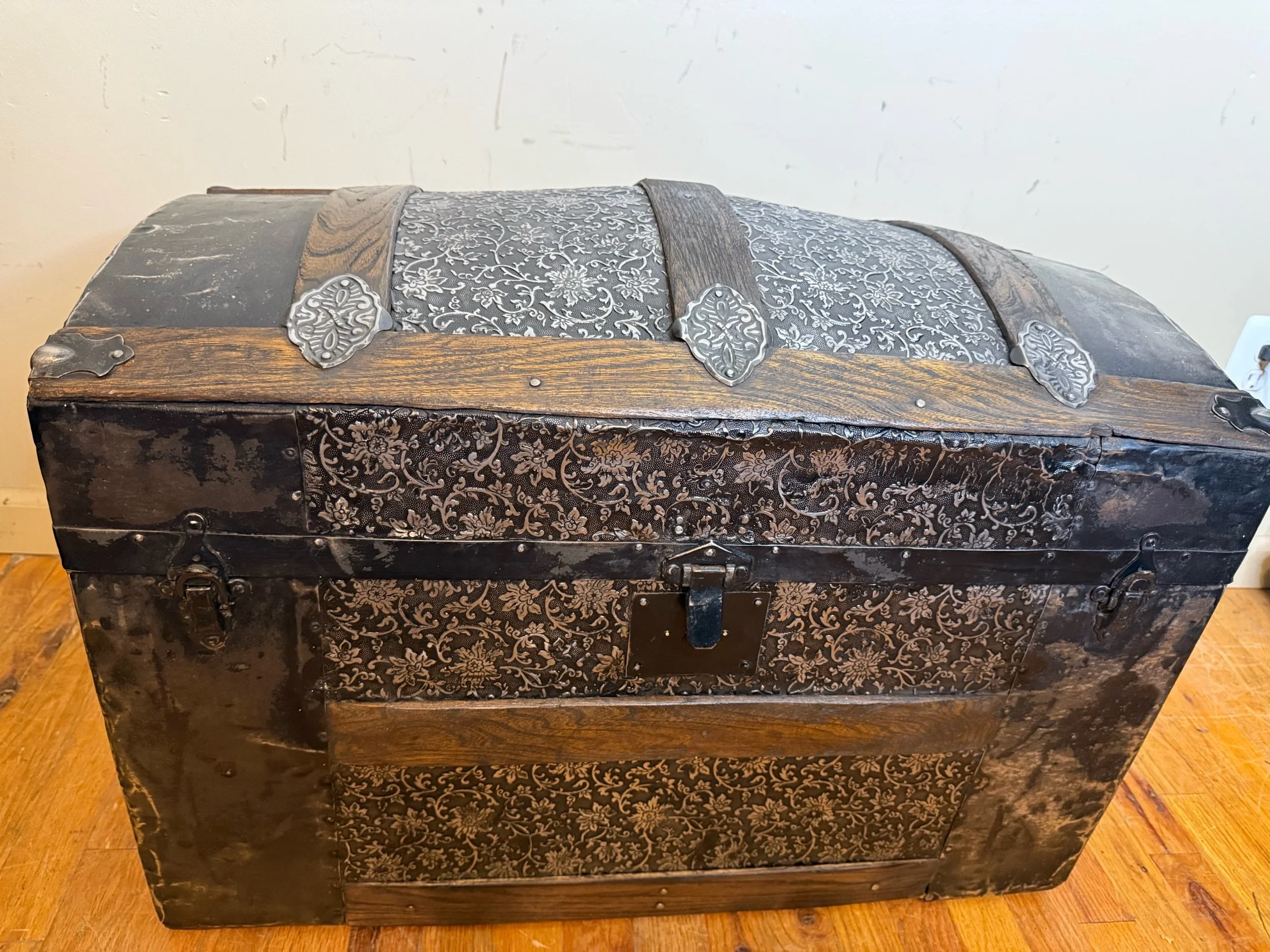 Restored Saratoga trunk with ornate Victorian hardware