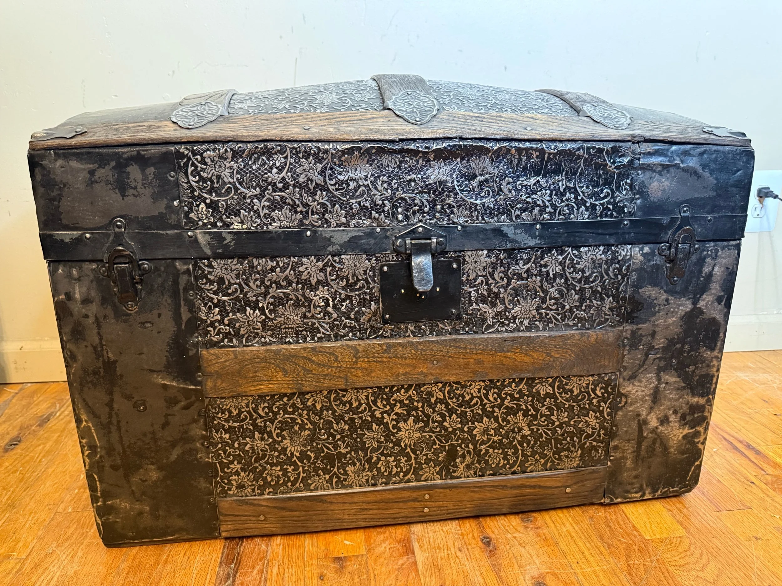 Antique heirloom storage chest with embossed tin panels