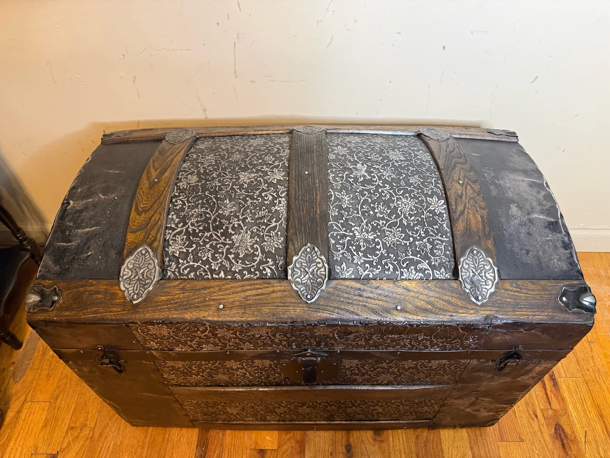 Original ornate hardware on restored Victorian trunk