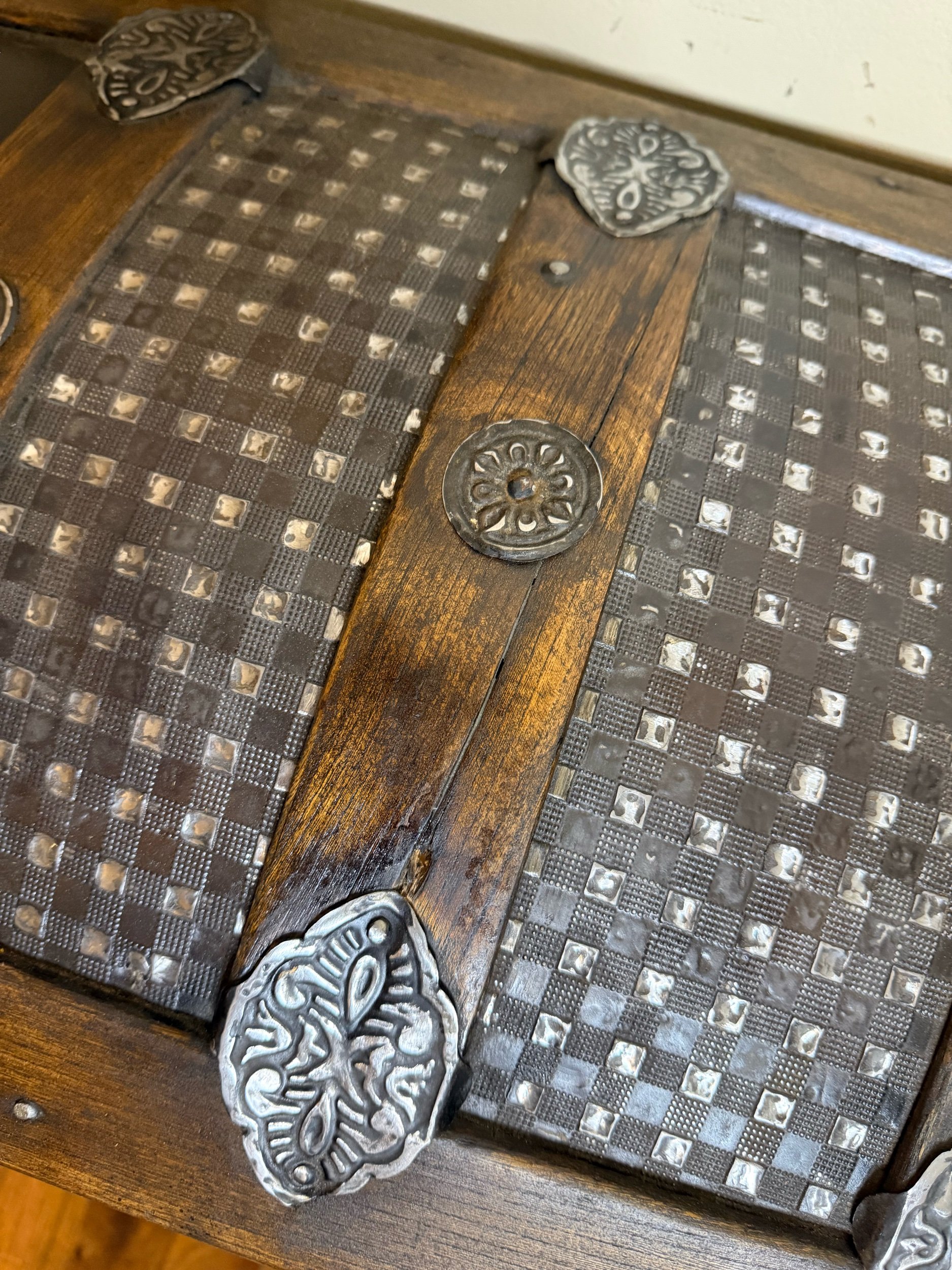 Embossed tin detail on late 1800s Saratoga trunk