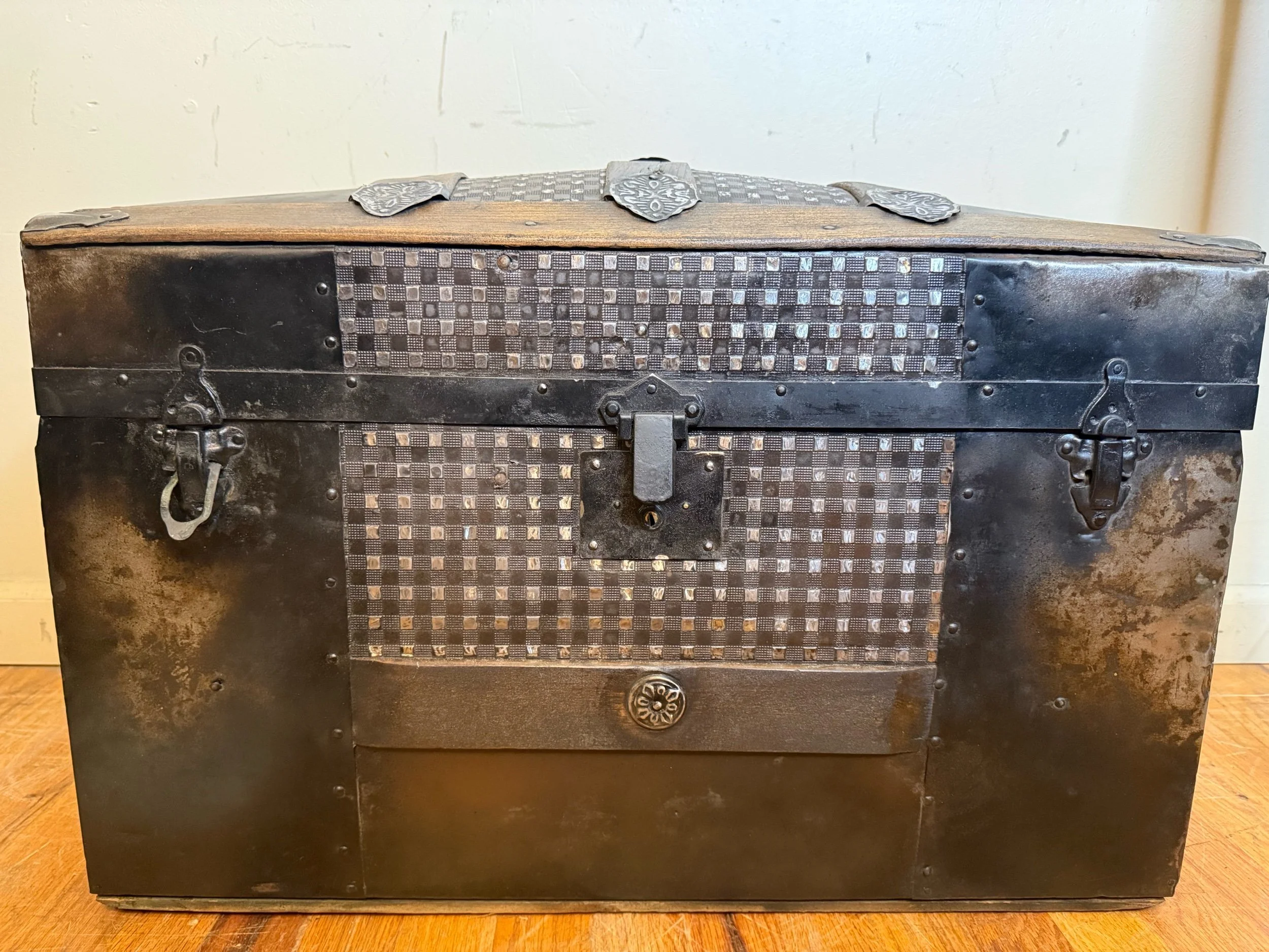 Small antique steamer trunk with dome top and walnut wood slats