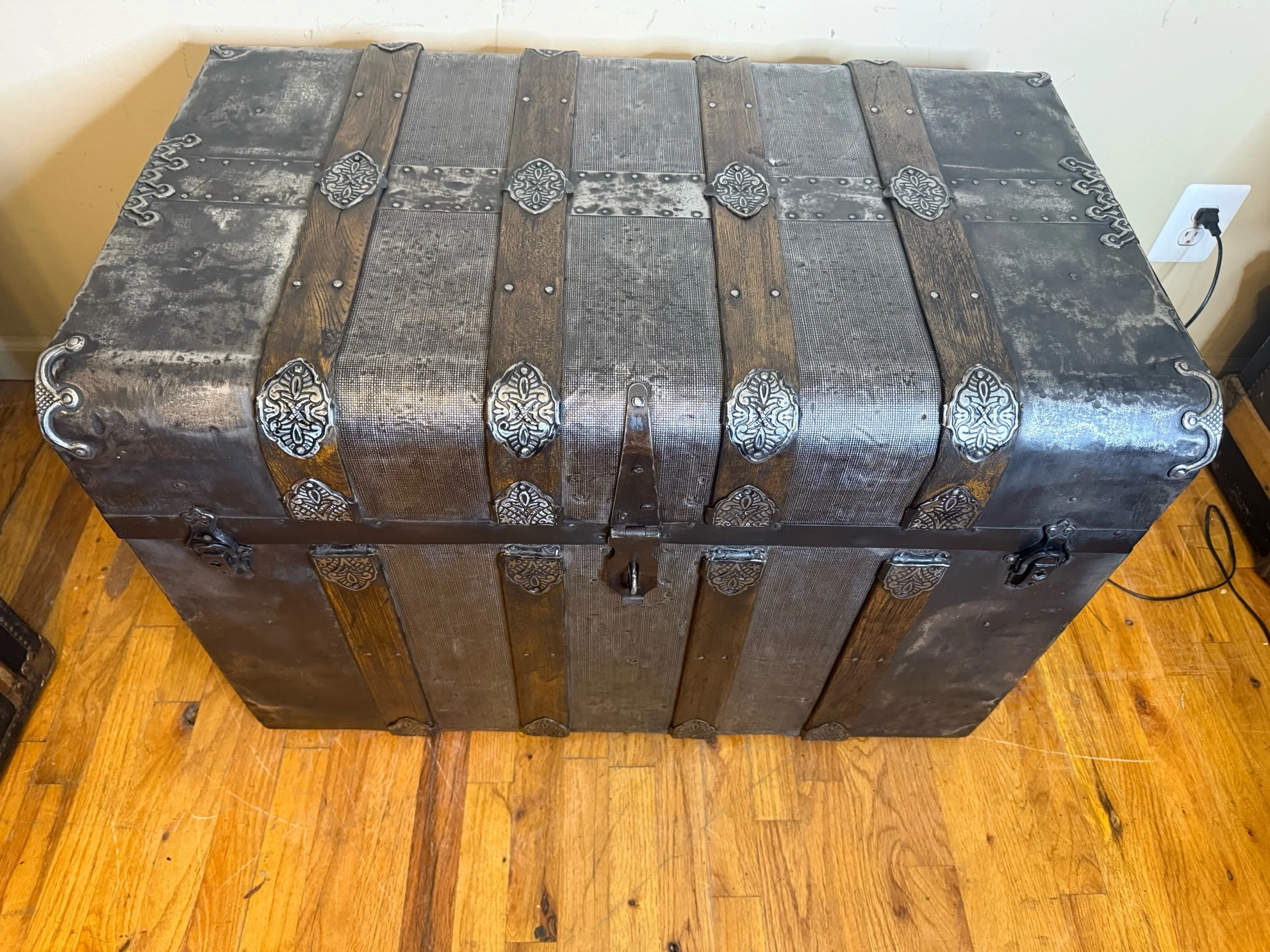 Antique monitor top trunk with ornate original hardware