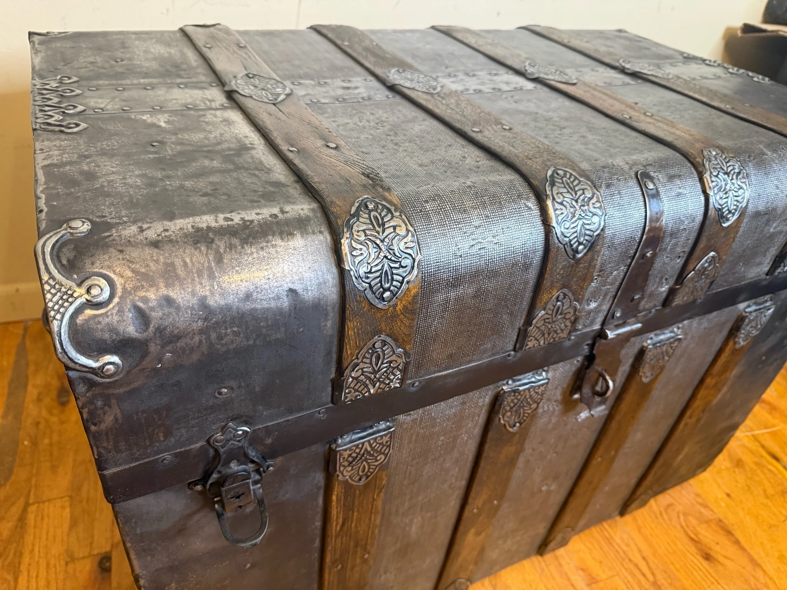 Victorian steamer trunk repurposed as an antique coffee table