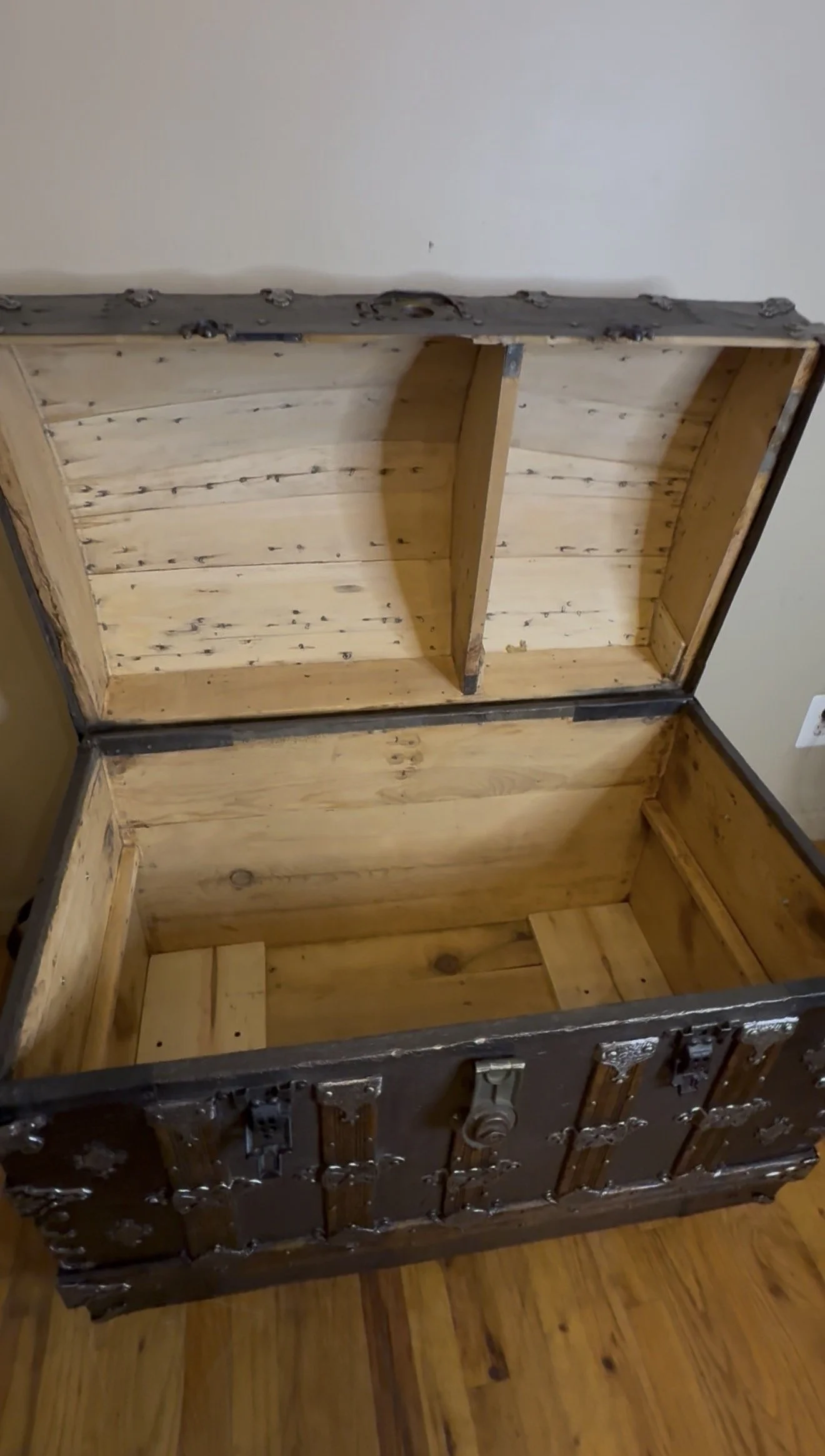 Clean sanded wood interior of large Victorian steamer trunk