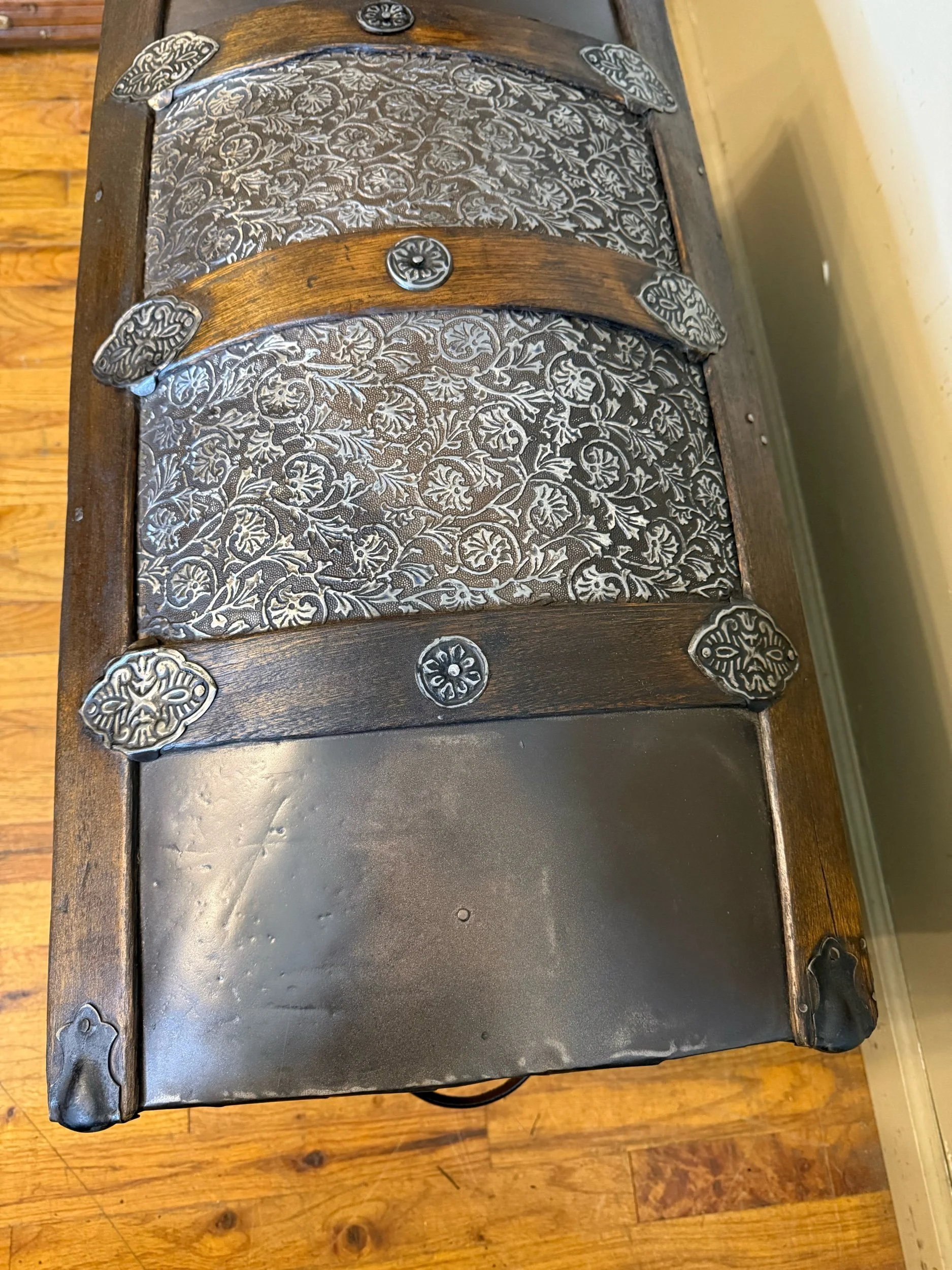 Close up of embossed tin pattern on Victorian Saratoga trunk