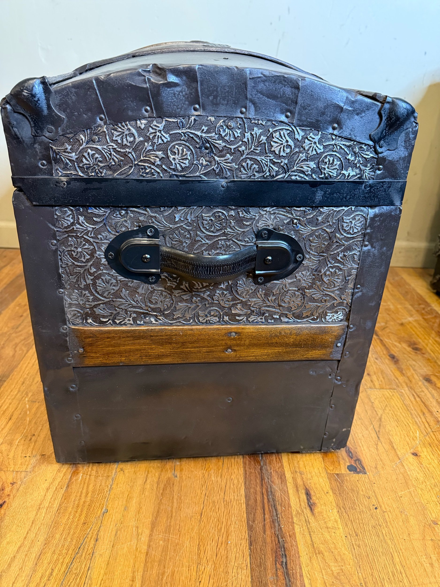 Custom black tooled leather handle on antique steamer trunk