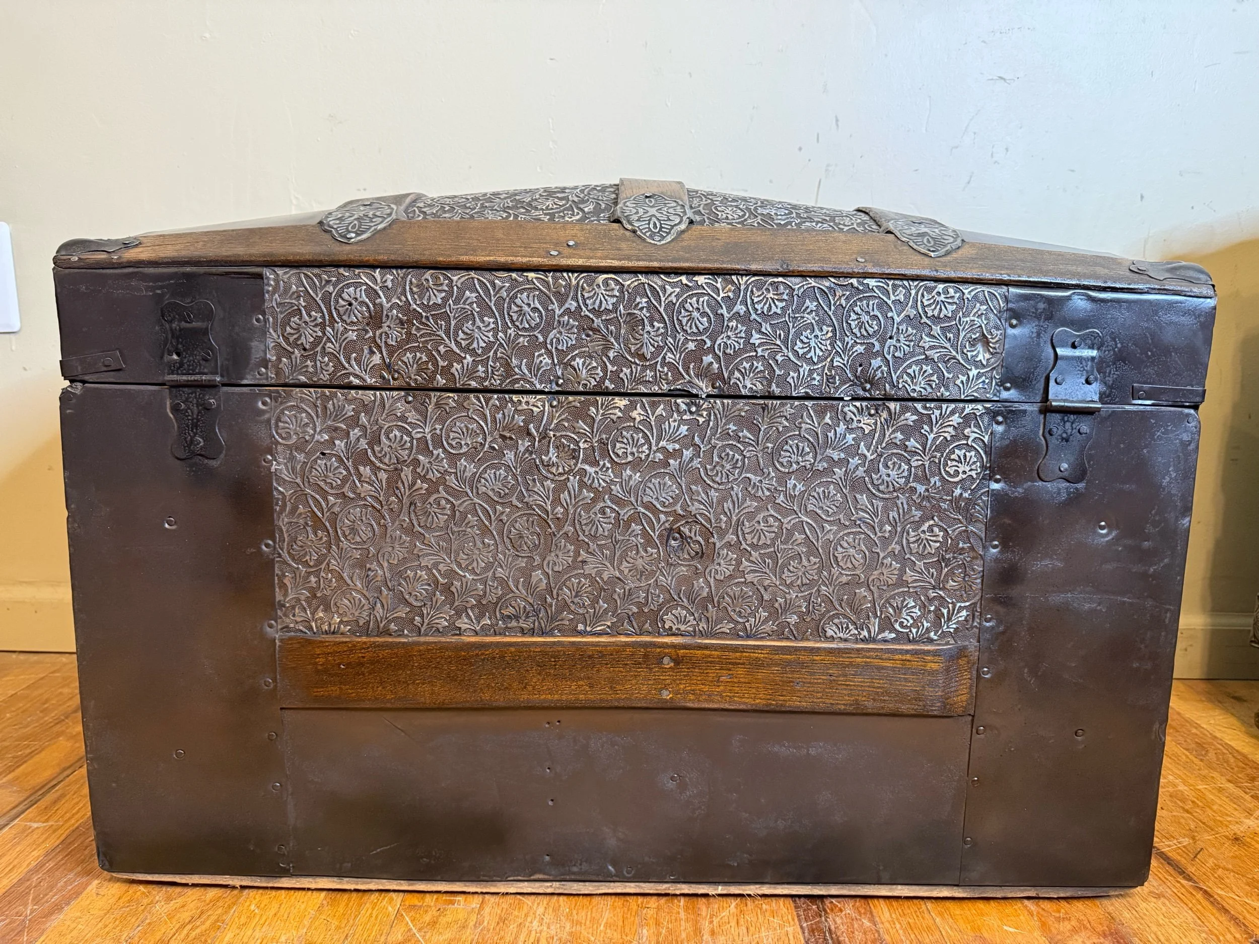Refinished antique tin trunk with walnut oak trim